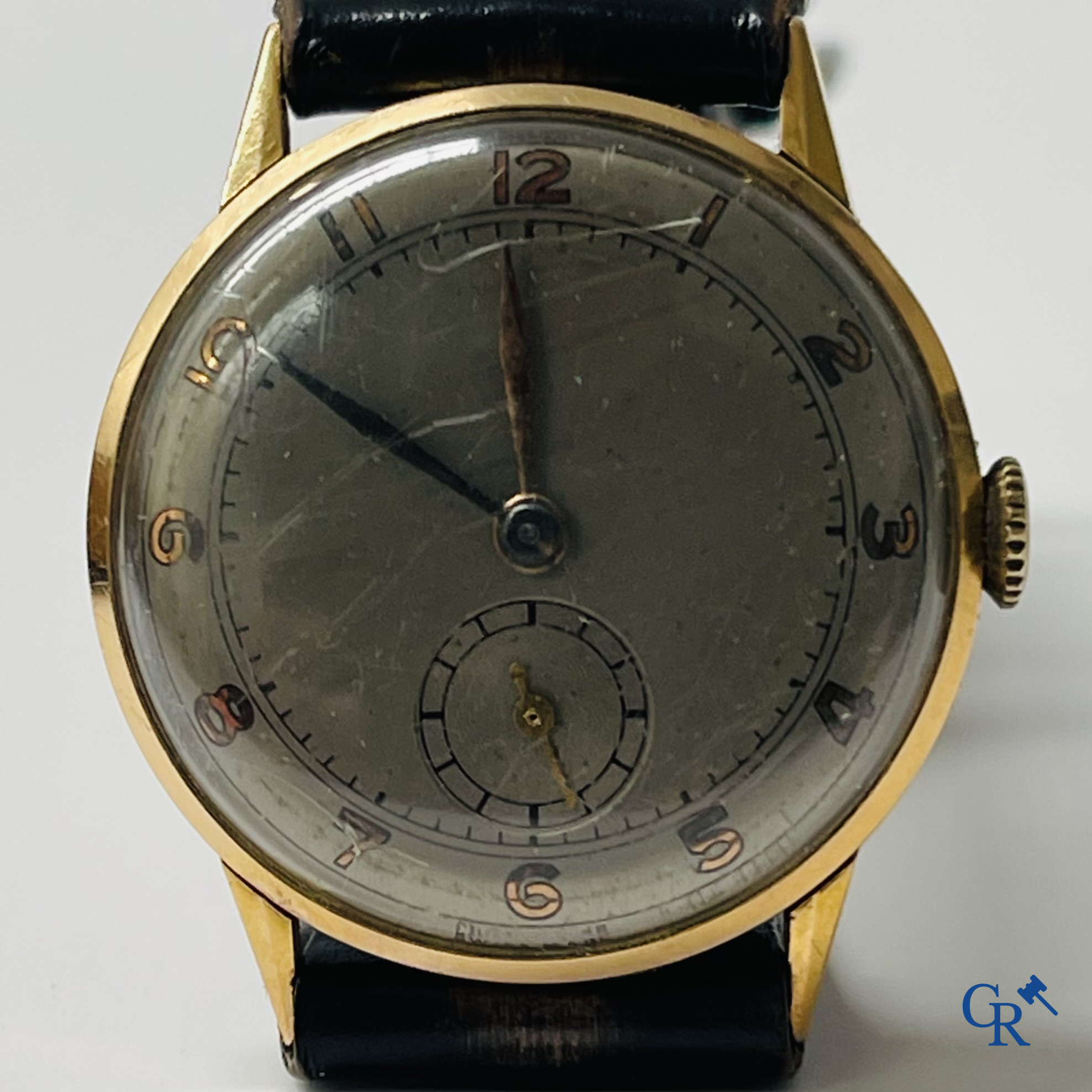 Watches. Swiss work. A men's wristwatch with gold 750°/00 watch case.