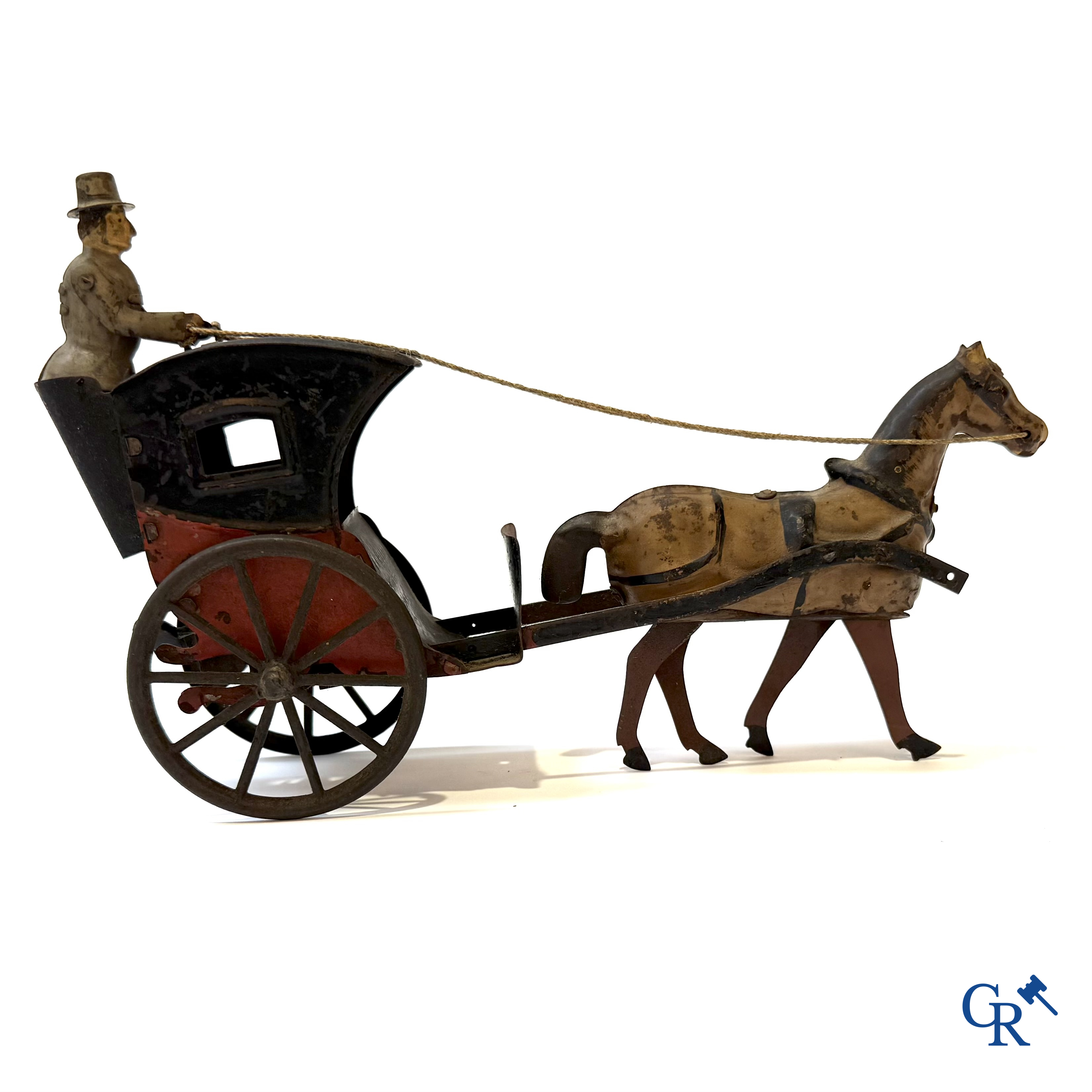 Fernand Martin, mechanisch speelgoed, zeldzame koets met paard, beschilderd blik. Gemerkt F.M. France Paris. Circa 1905.