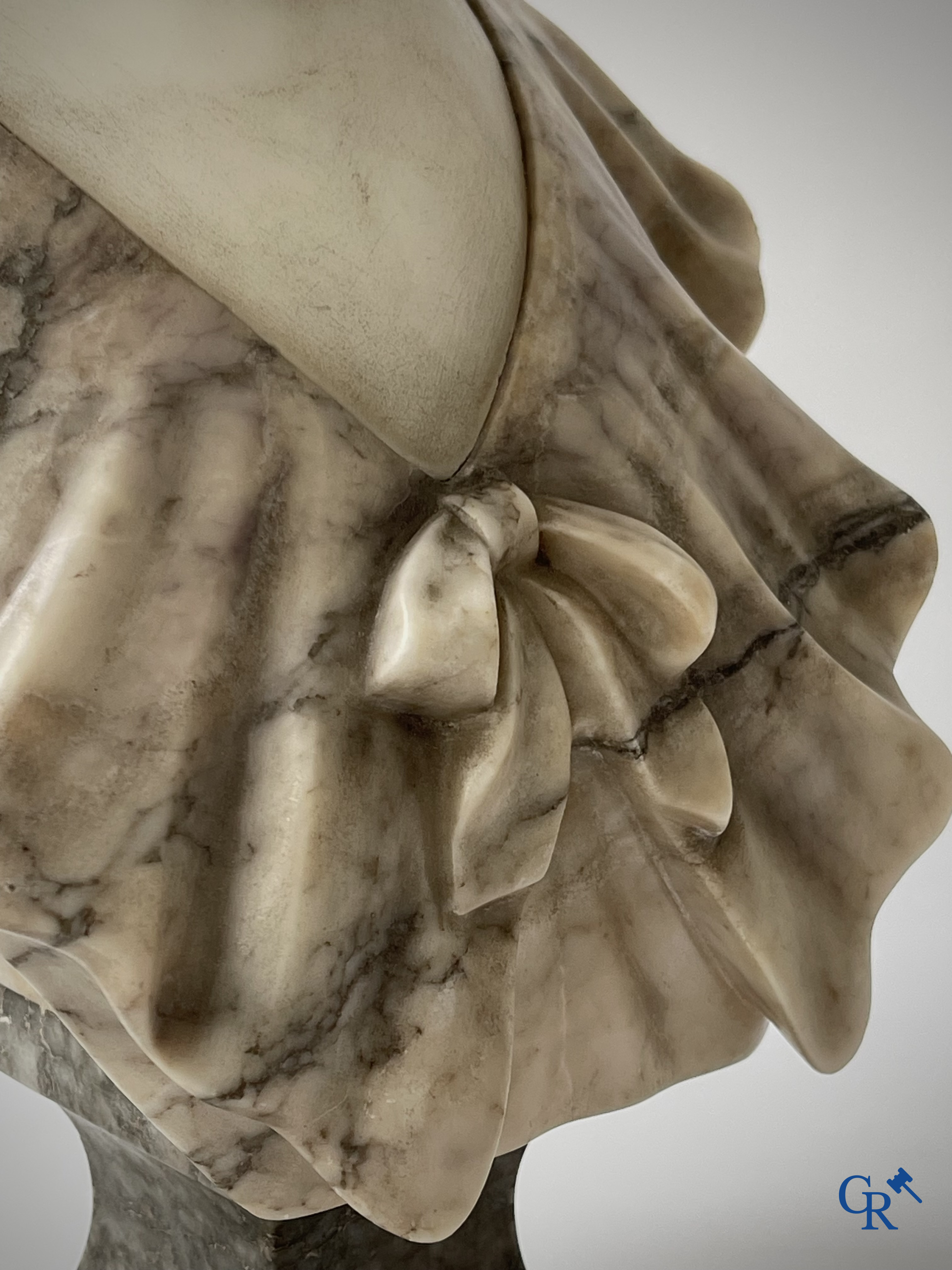 G. Van Vaerenbergh. A large bust in marble signed Van Vaerenbergh and a bust in marble and bronze. Around 1920.