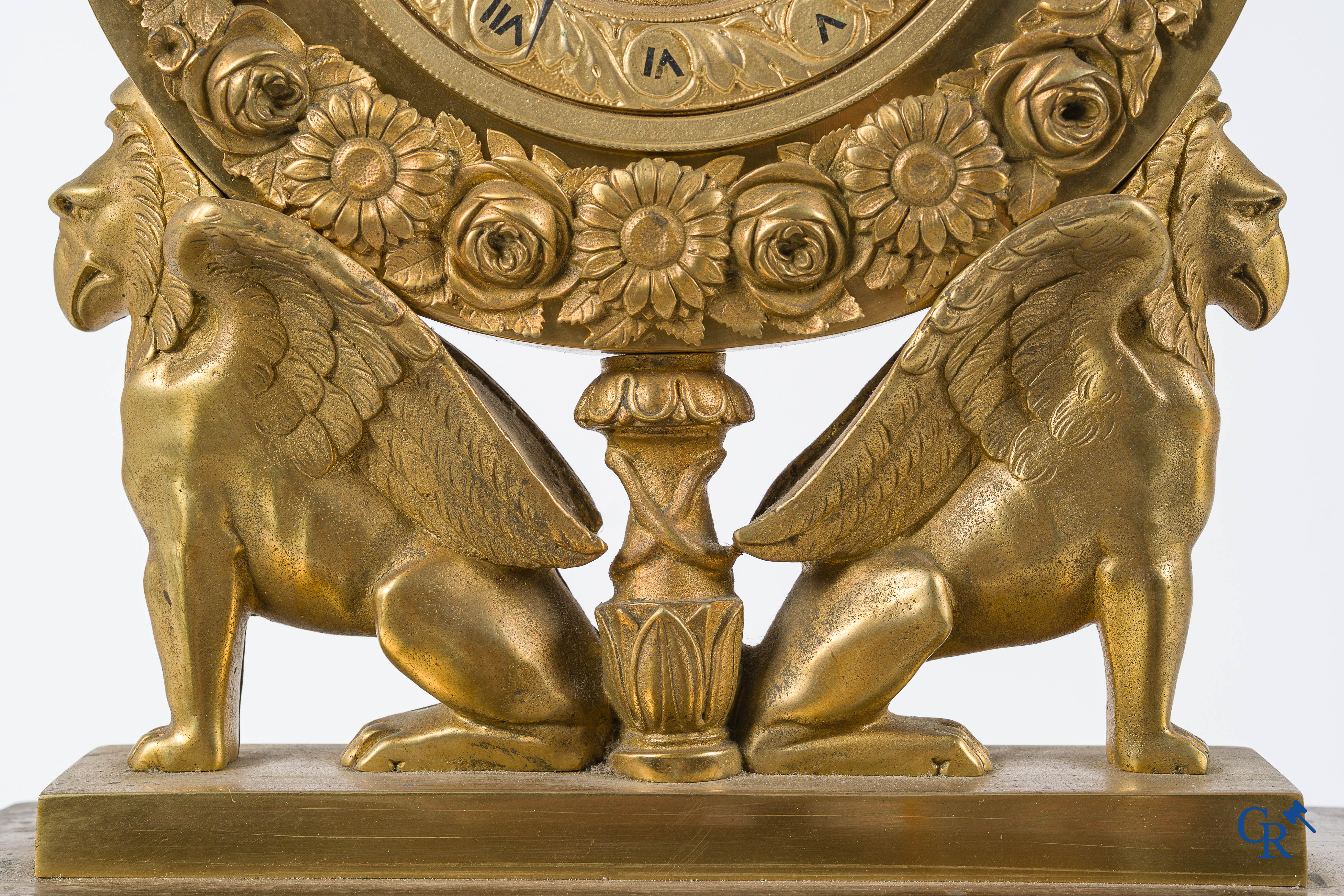 Charles X period. Beautiful pendulum in gilded bronze, a lyre held up by griffins. France, circa 1825.