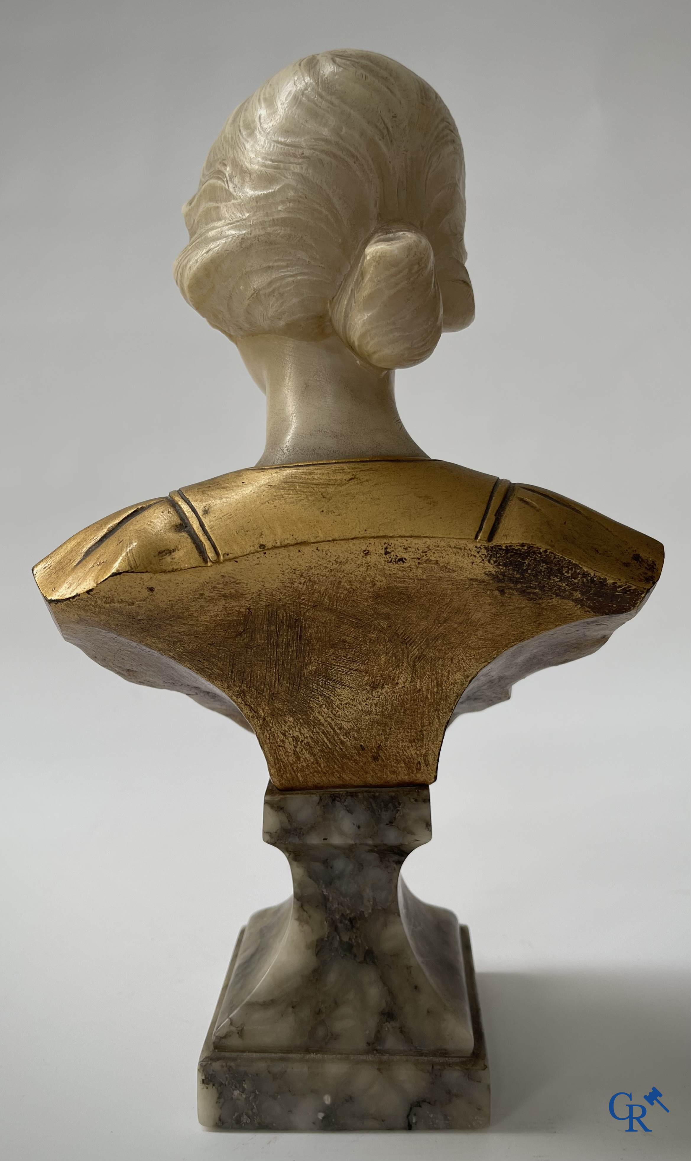 G. Van Vaerenbergh. A large bust in marble signed Van Vaerenbergh and a bust in marble and bronze. Around 1920.