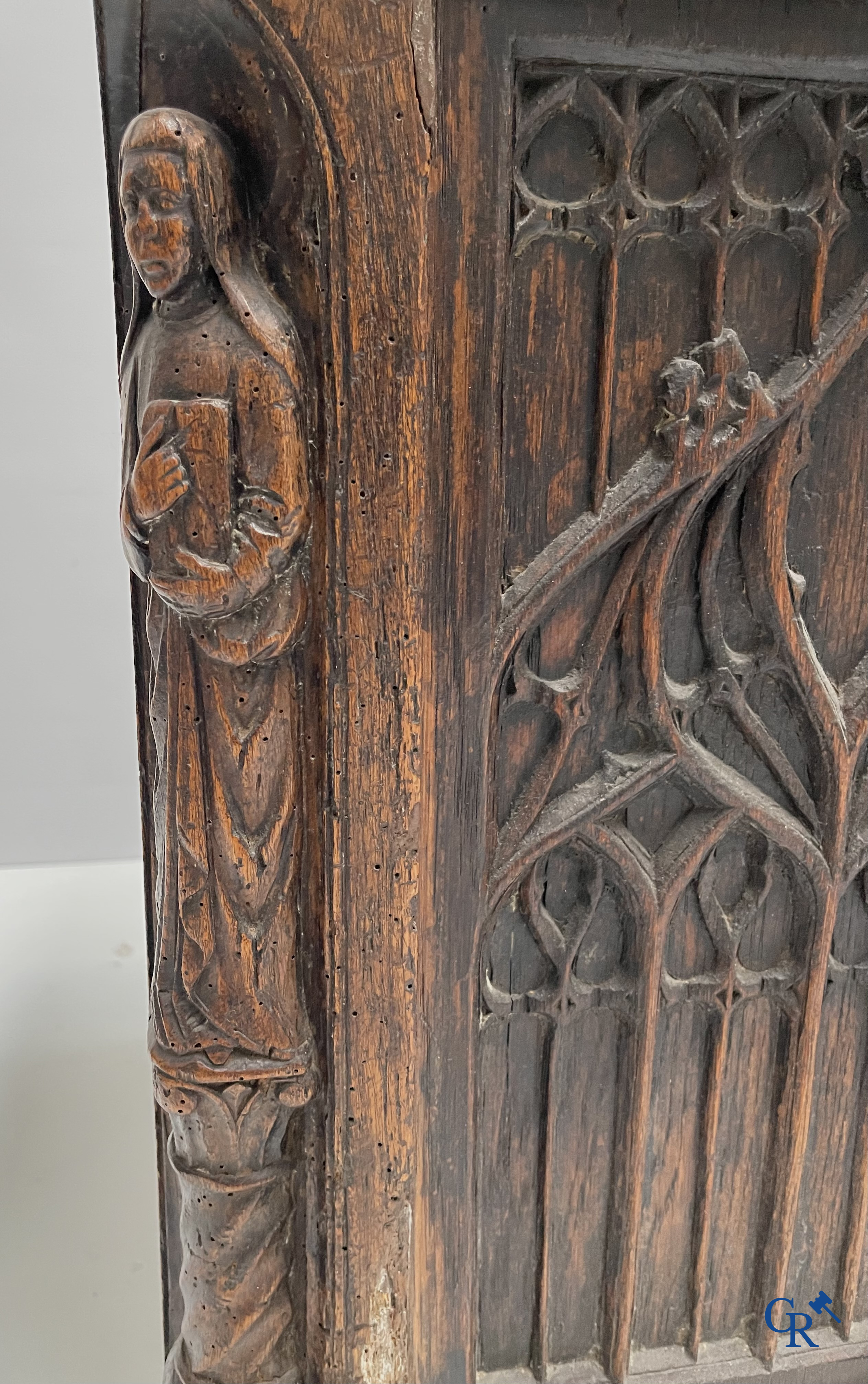 Furniture. Oak trunk with carved panels in Gothic style. Early 19th century.