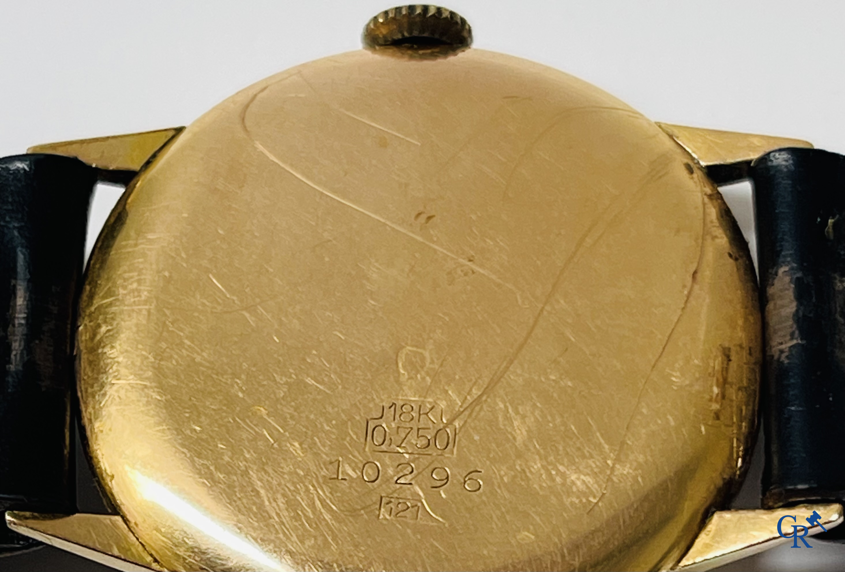 Watches. Swiss work. A men's wristwatch with gold 750°/00 watch case.