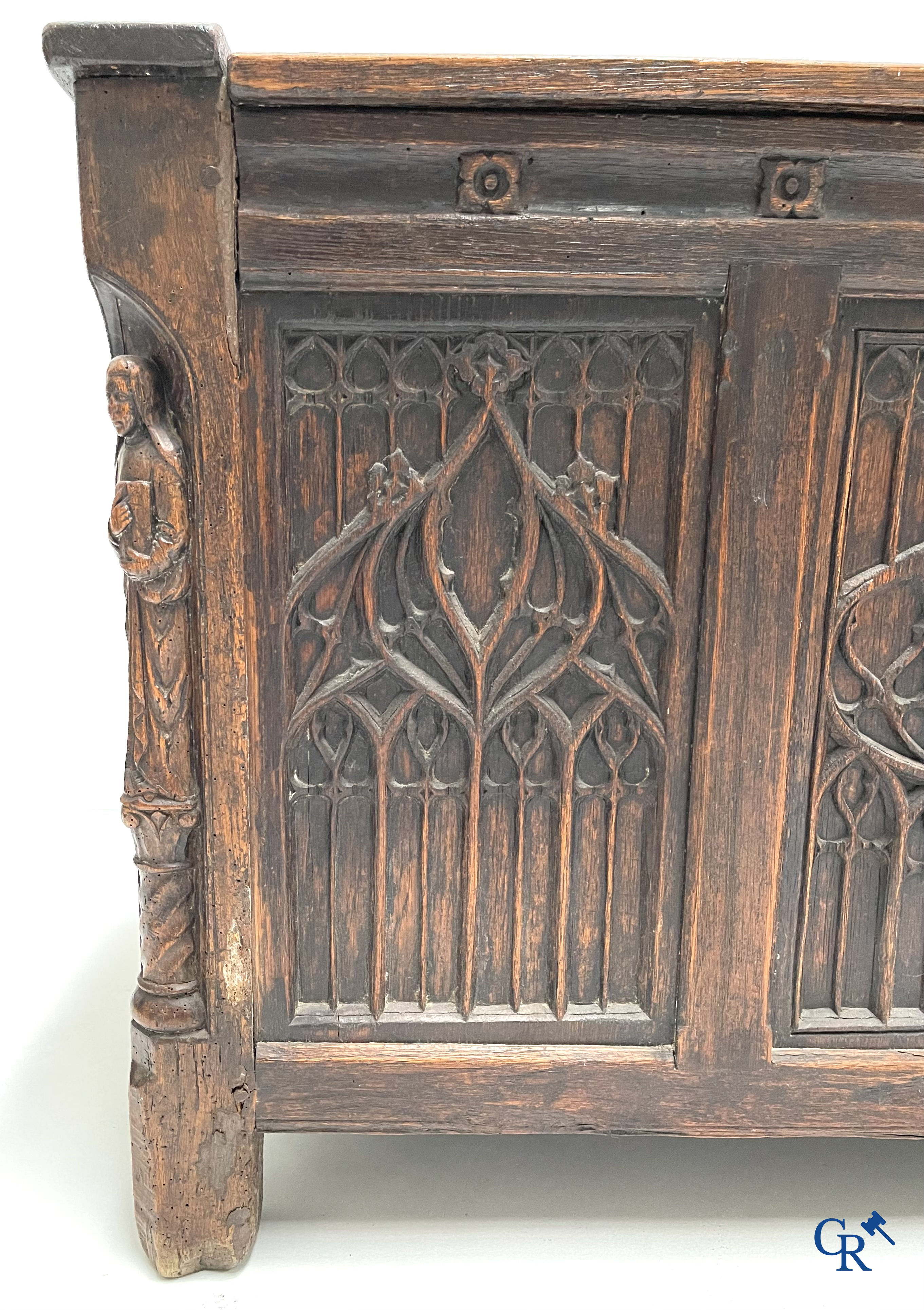 Furniture. Oak trunk with carved panels in Gothic style. Early 19th century.