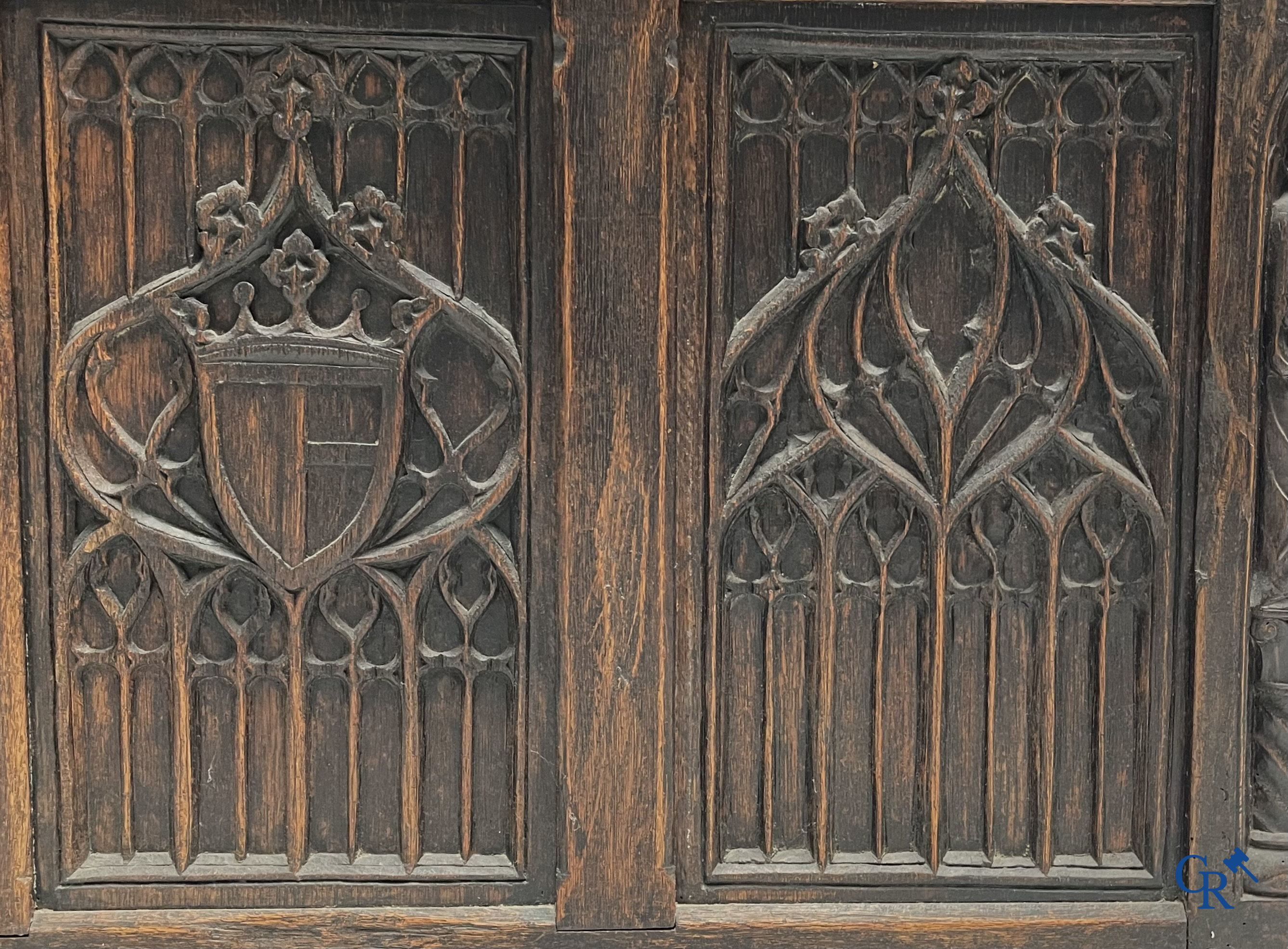 Furniture. Oak trunk with carved panels in Gothic style. Early 19th century.