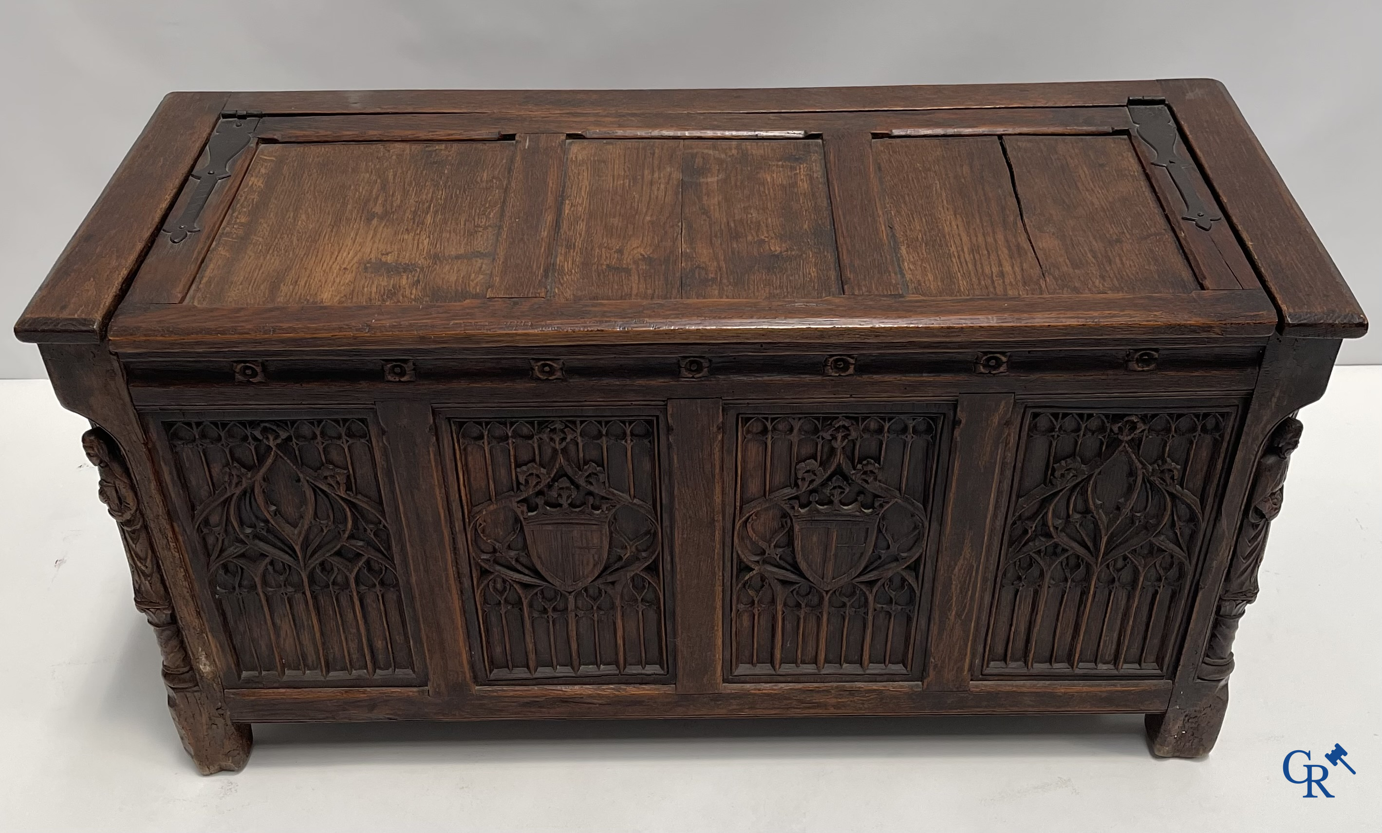 Furniture. Oak trunk with carved panels in Gothic style. Early 19th century.