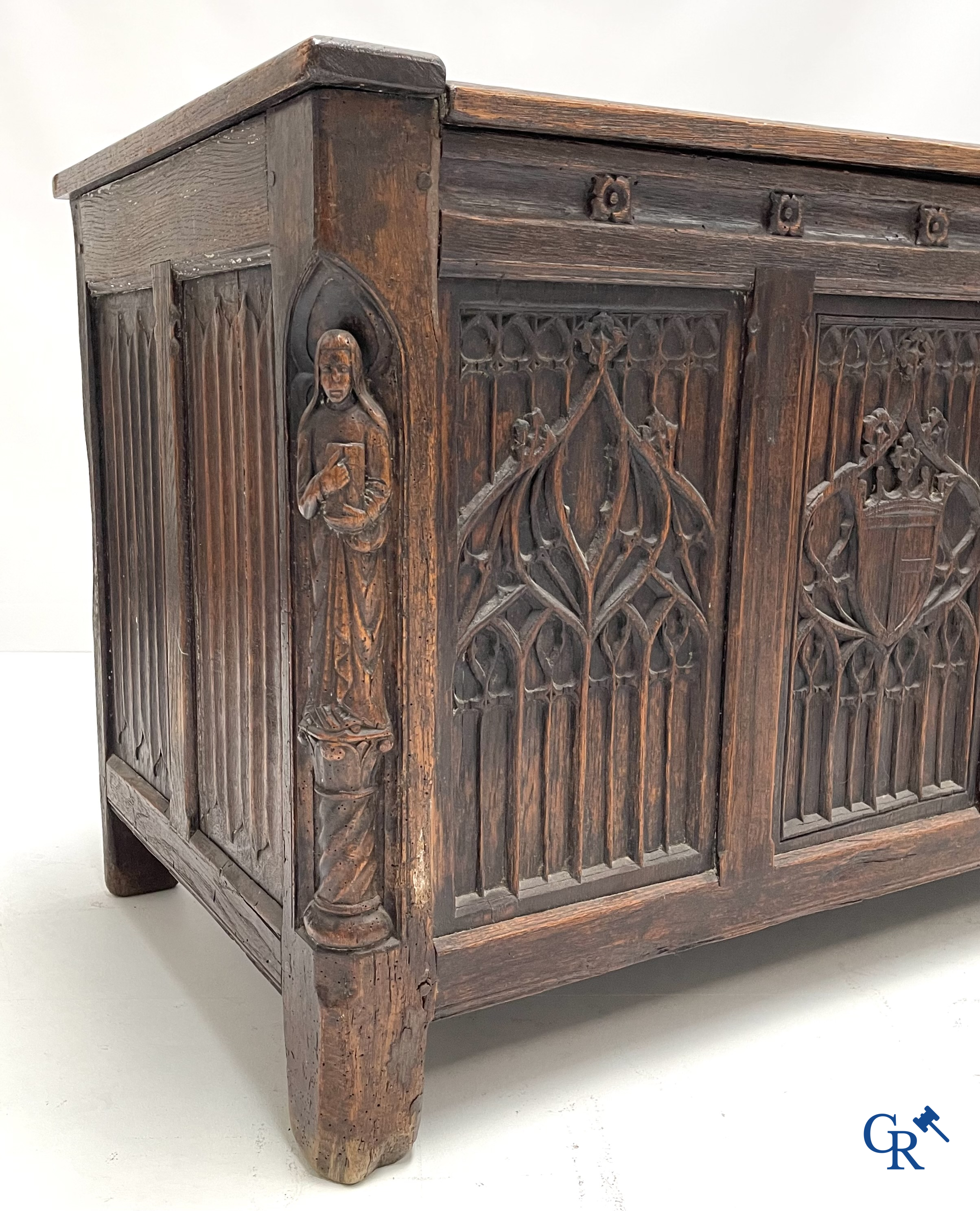 Furniture. Oak trunk with carved panels in Gothic style. Early 19th century.