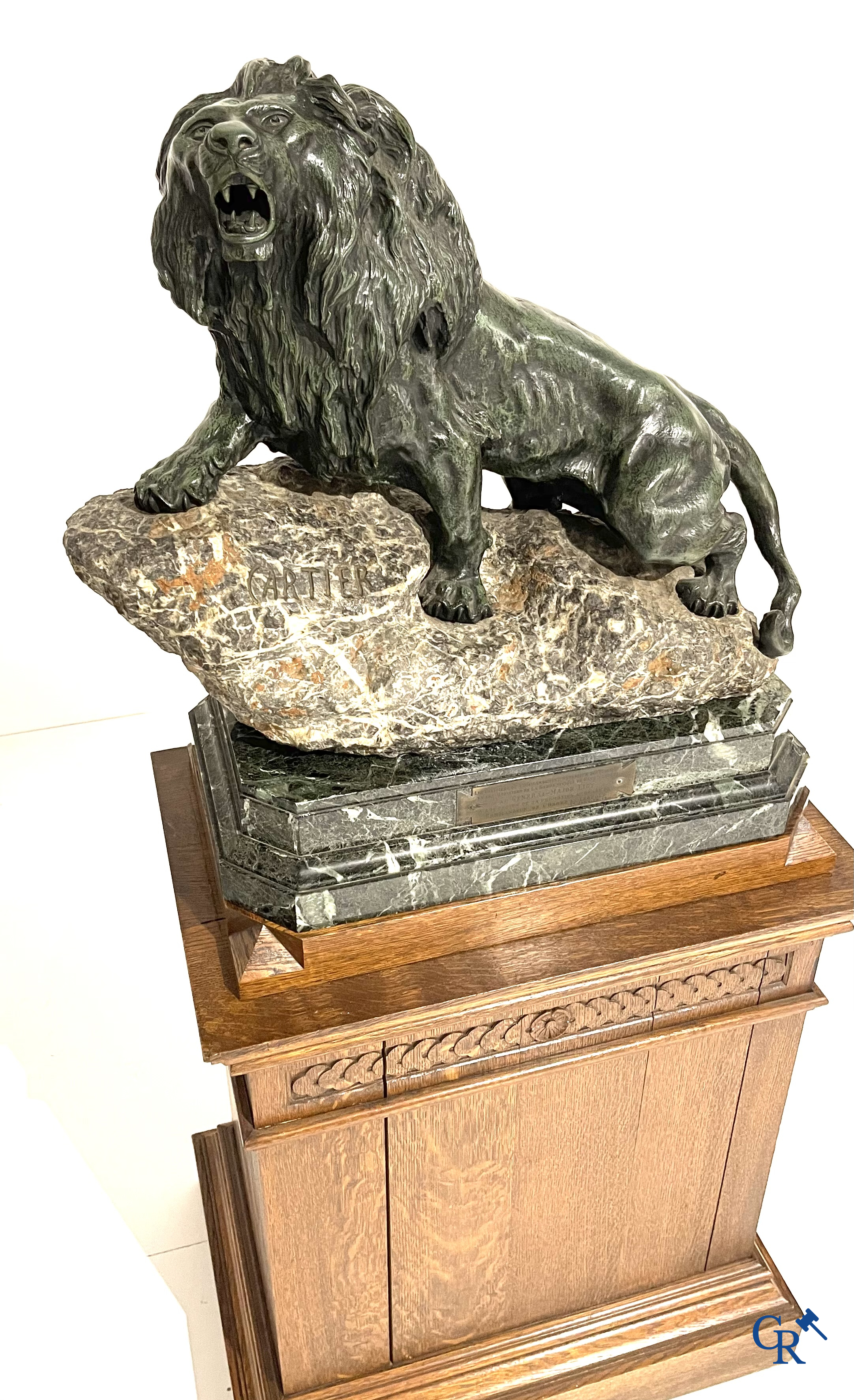 Thomas François Cartier (1879-1936) "Roaring lion" Important statue in bronze and stone on a wooden base.