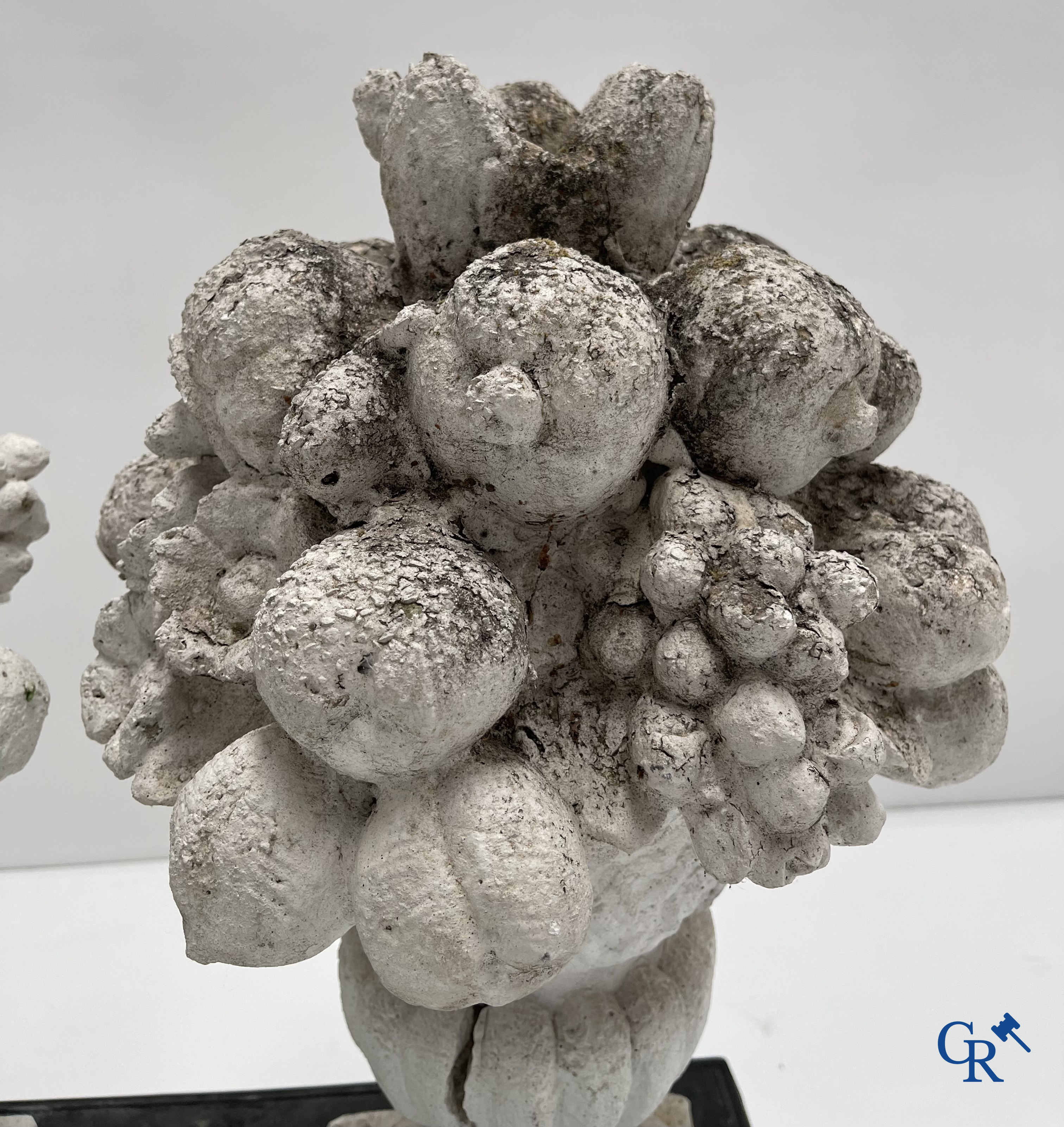 Garden decoration, a pair of stone garden ornaments.