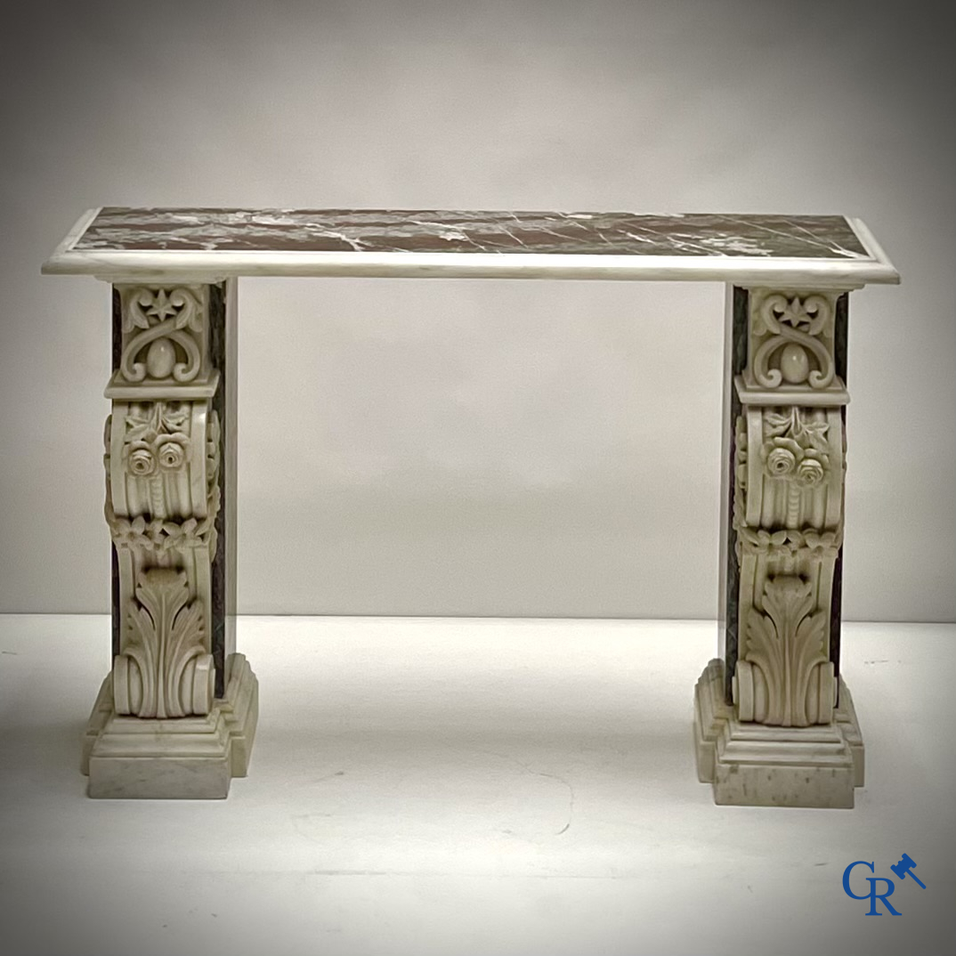 An imposing wall console in multiple types of marble. 19th century.
