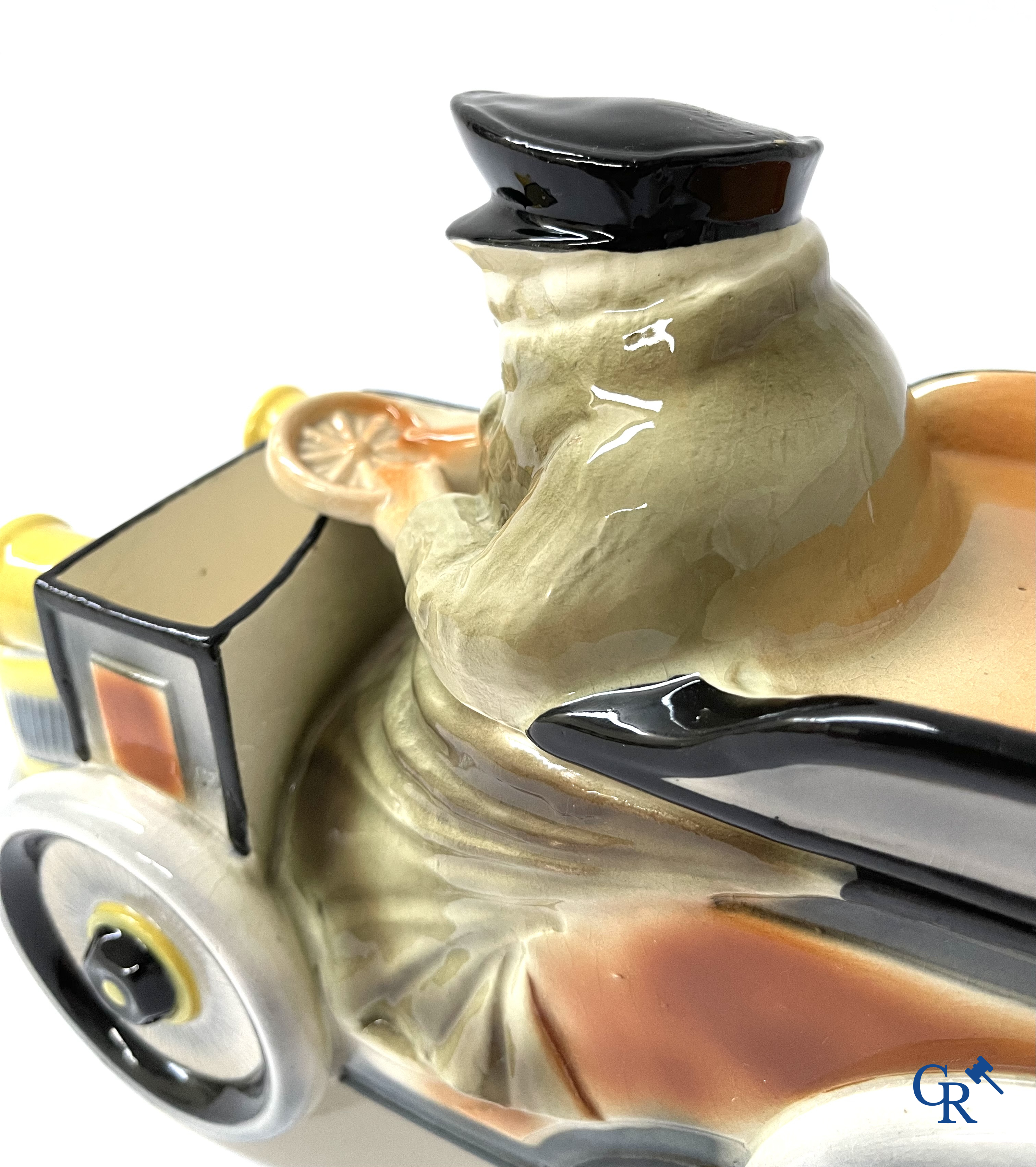 Faïencerie Fives Lille. L'Automobiliste, a large tobacco jar in the shape of a vintage car with a driver. Around 1910.