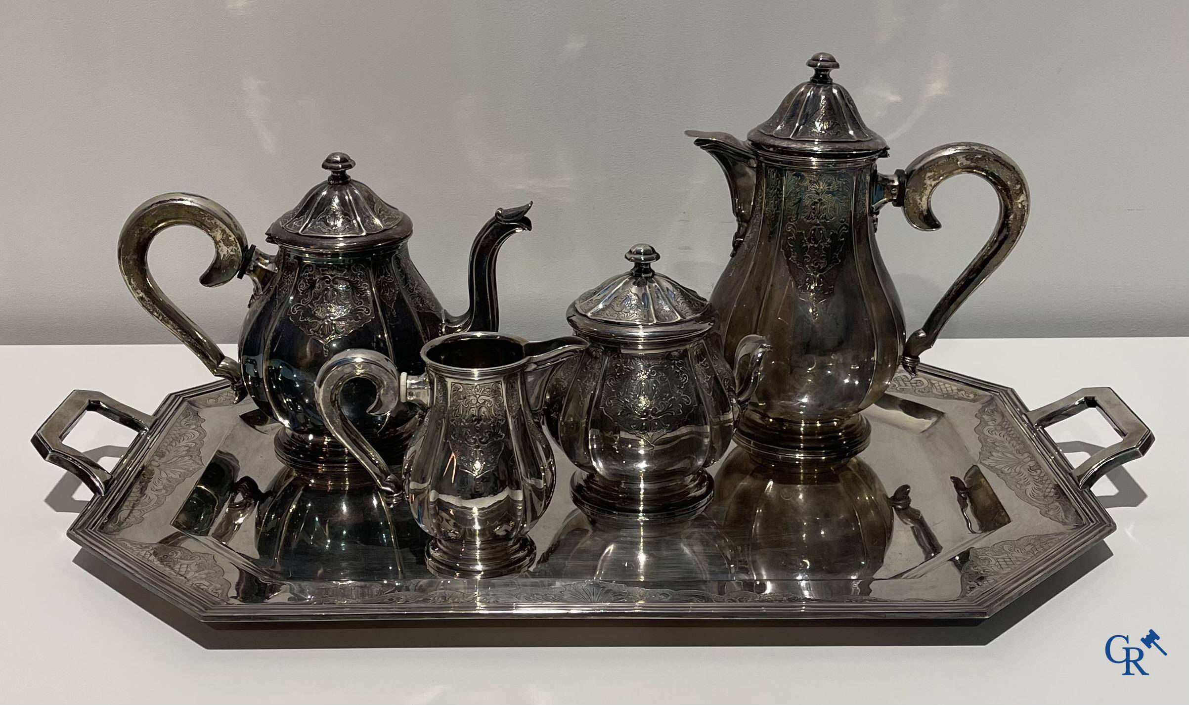 Un service à café et à thé 5 pièces en argent 835°/00.