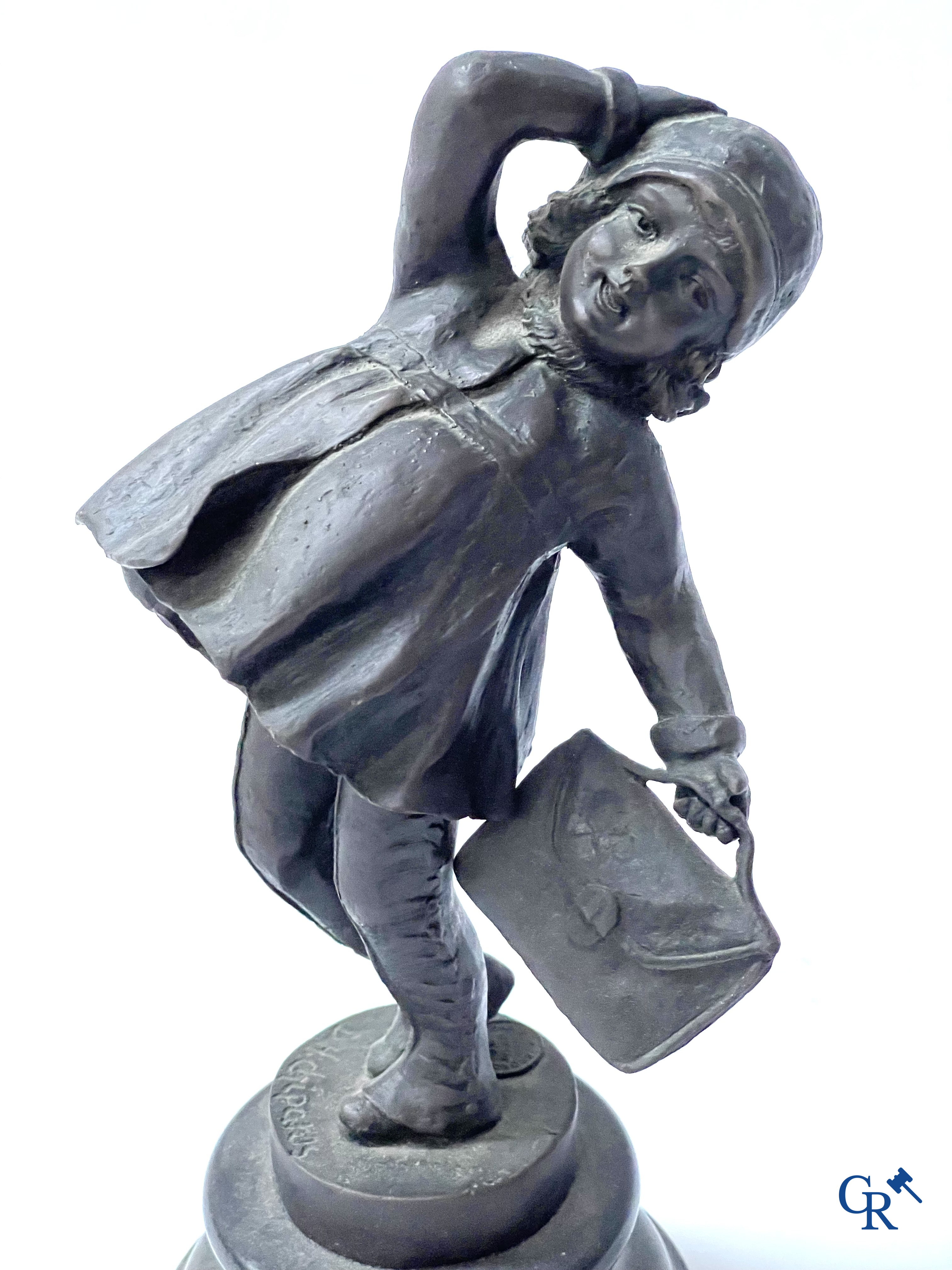 A bronze group after Raoul Larche with 5 children and a basket and 2 bronze statuettes after Chiparus. Posthumous 20th century.