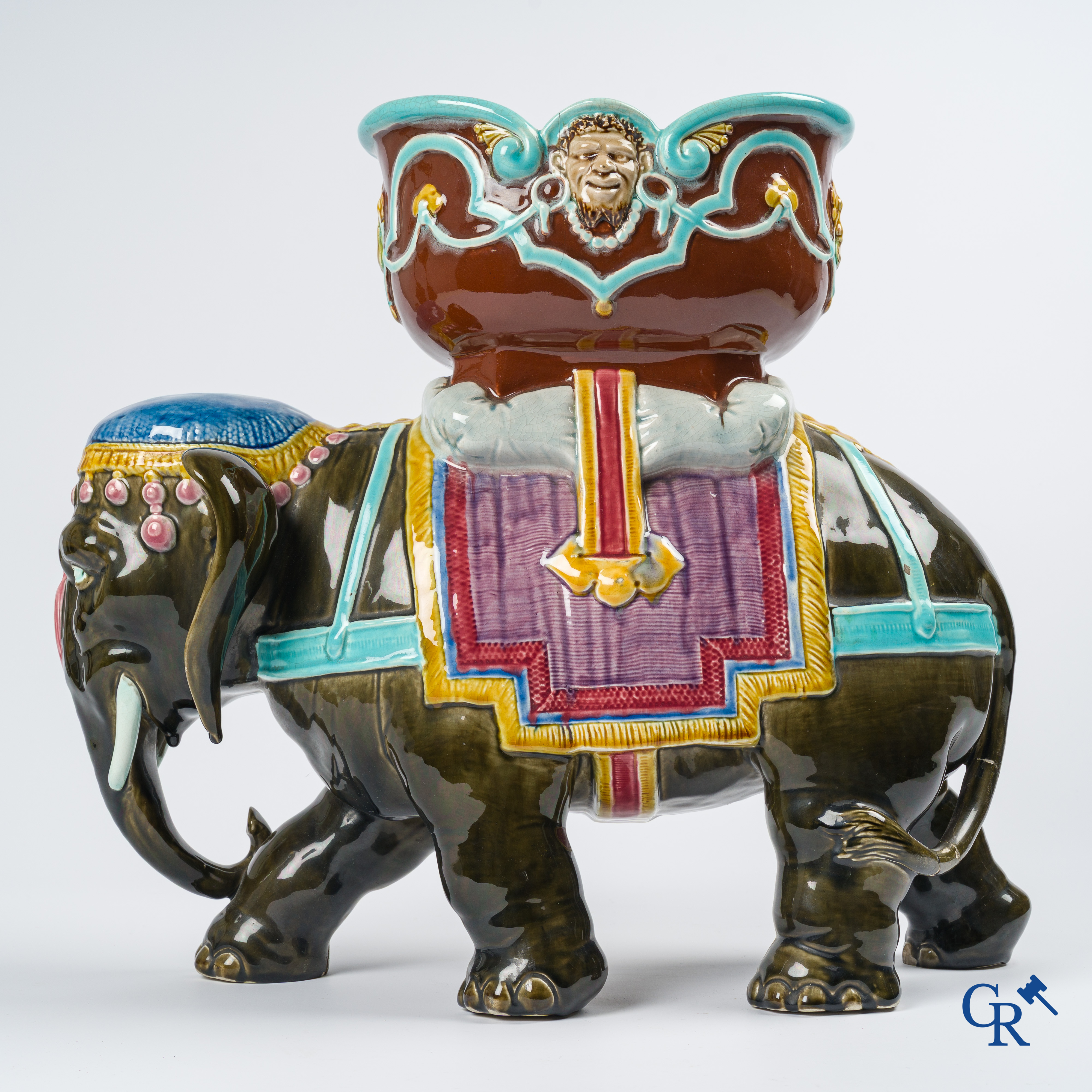 Orchies. A large elephant in multicolored decorated pottery, barbotine. France, circa 1900.