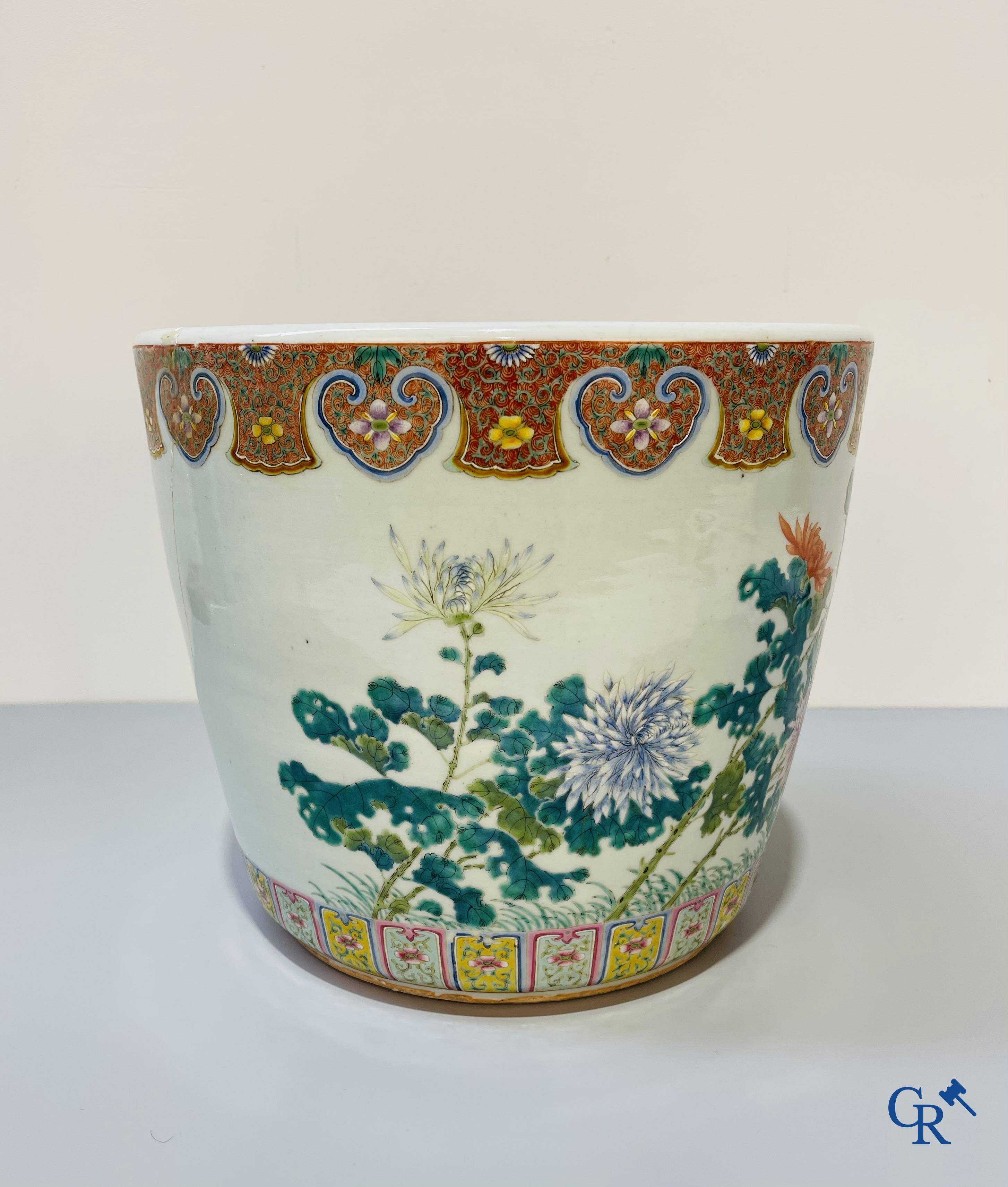 Asian Art, a large Chinese famille rose porcelain jardinière with a decor of flowers and birds.