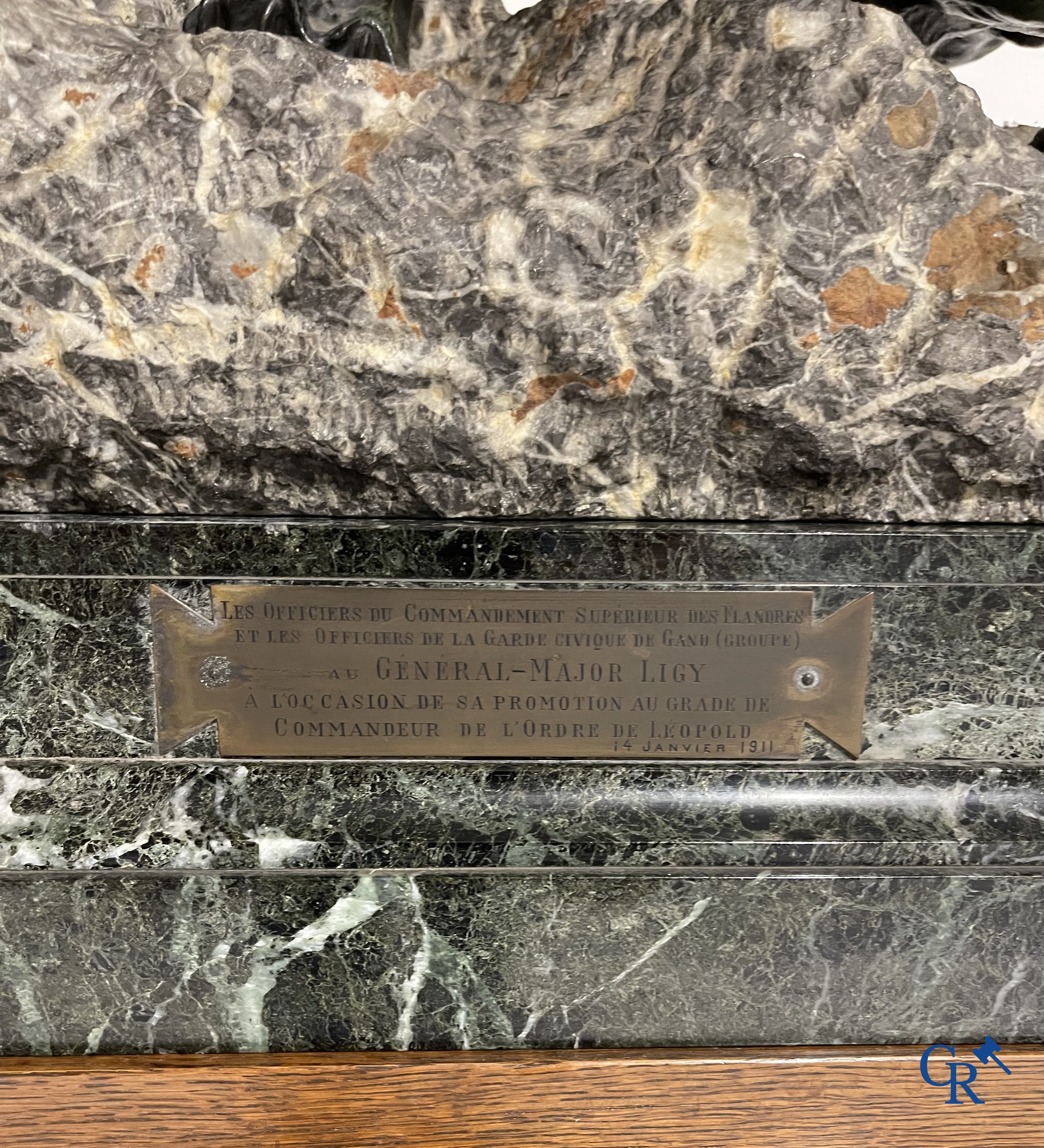 Thomas François Cartier (1879-1936) "Roaring lion" Important statue in bronze and stone on a wooden base.