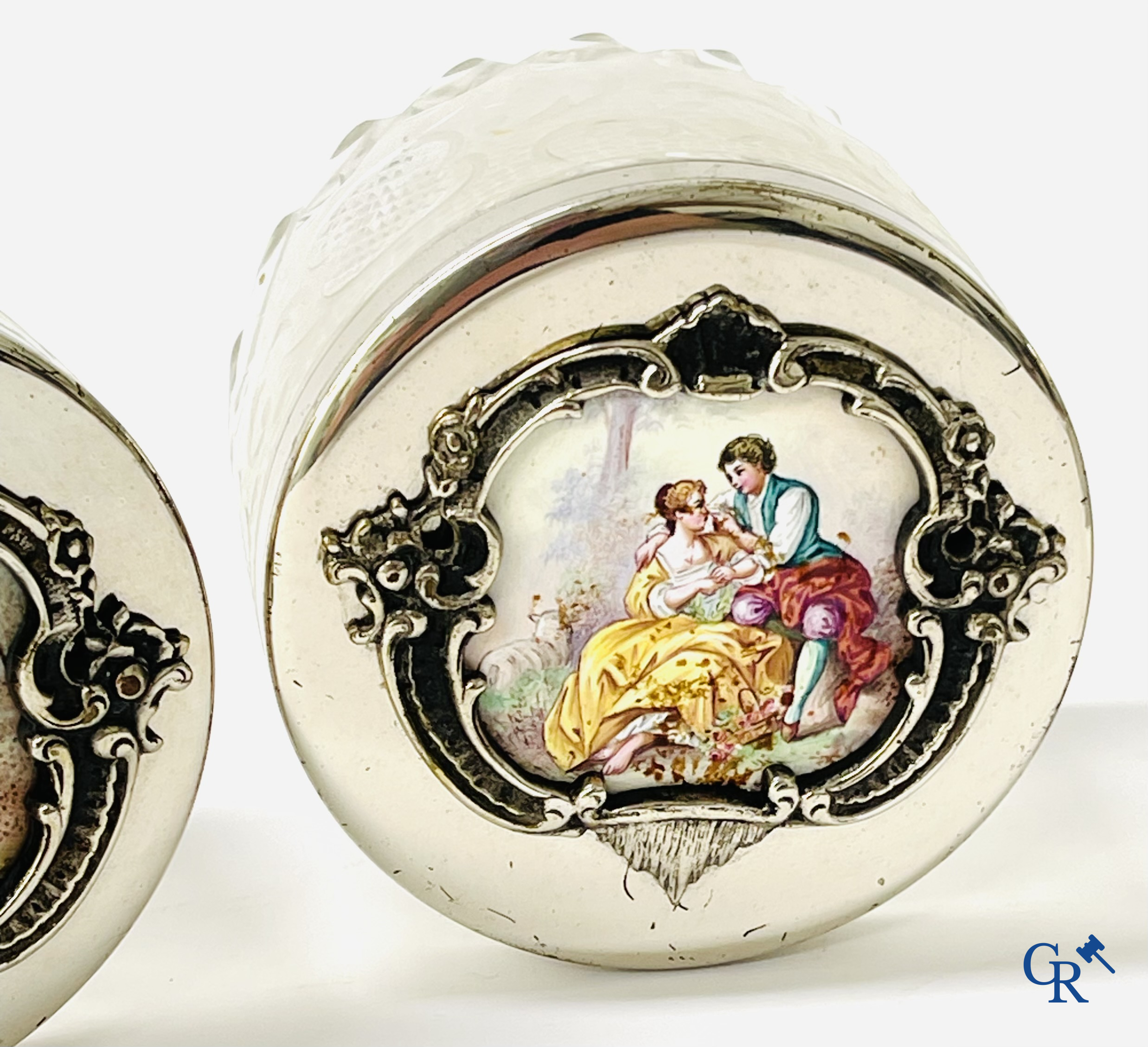 A seven-piece toilet set in silver-plated metal, finely cut crystal and enamelled plaques.