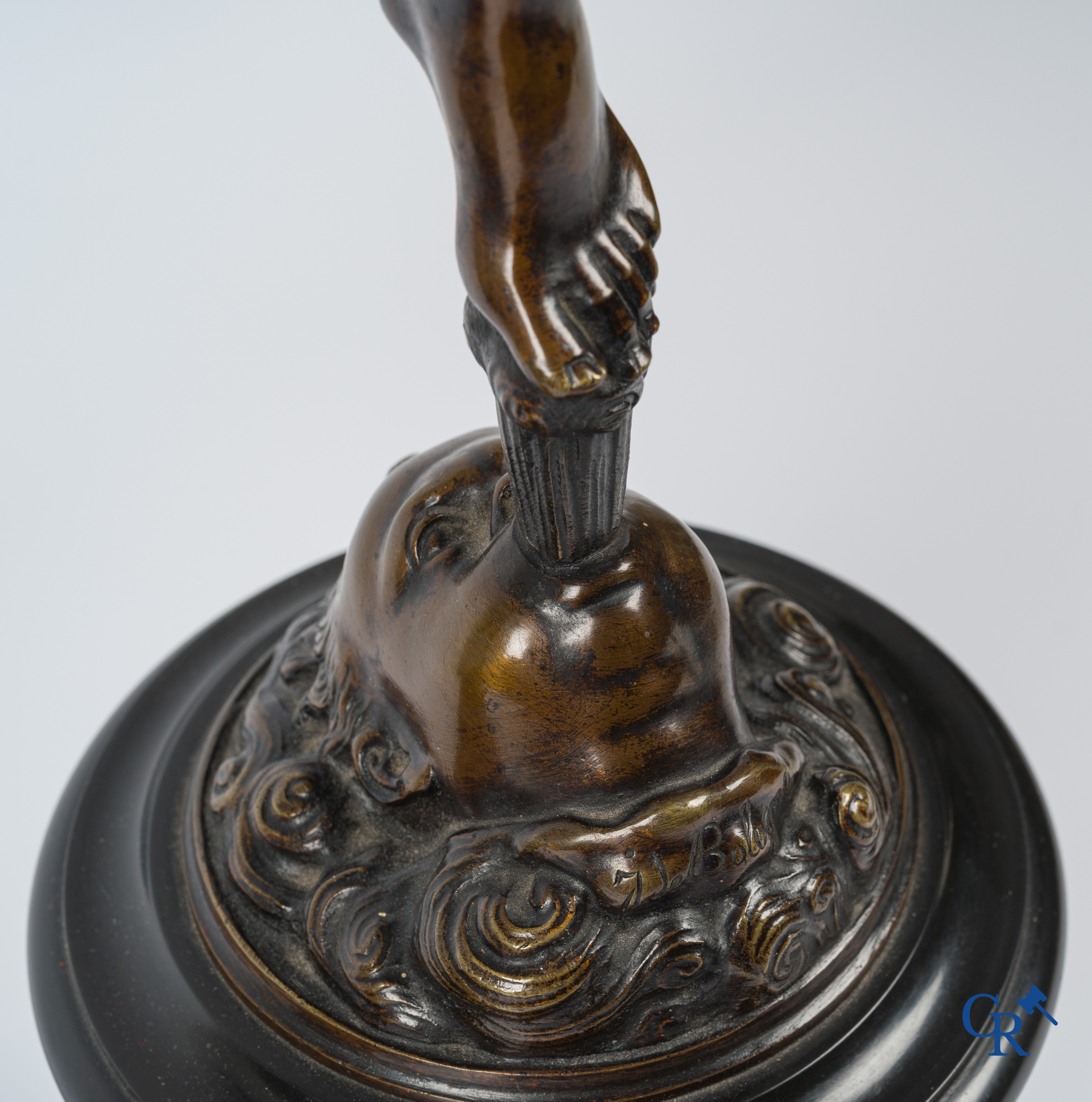 A pair of imposing bronze statues in the antique style after a model by Jean De Bologne.