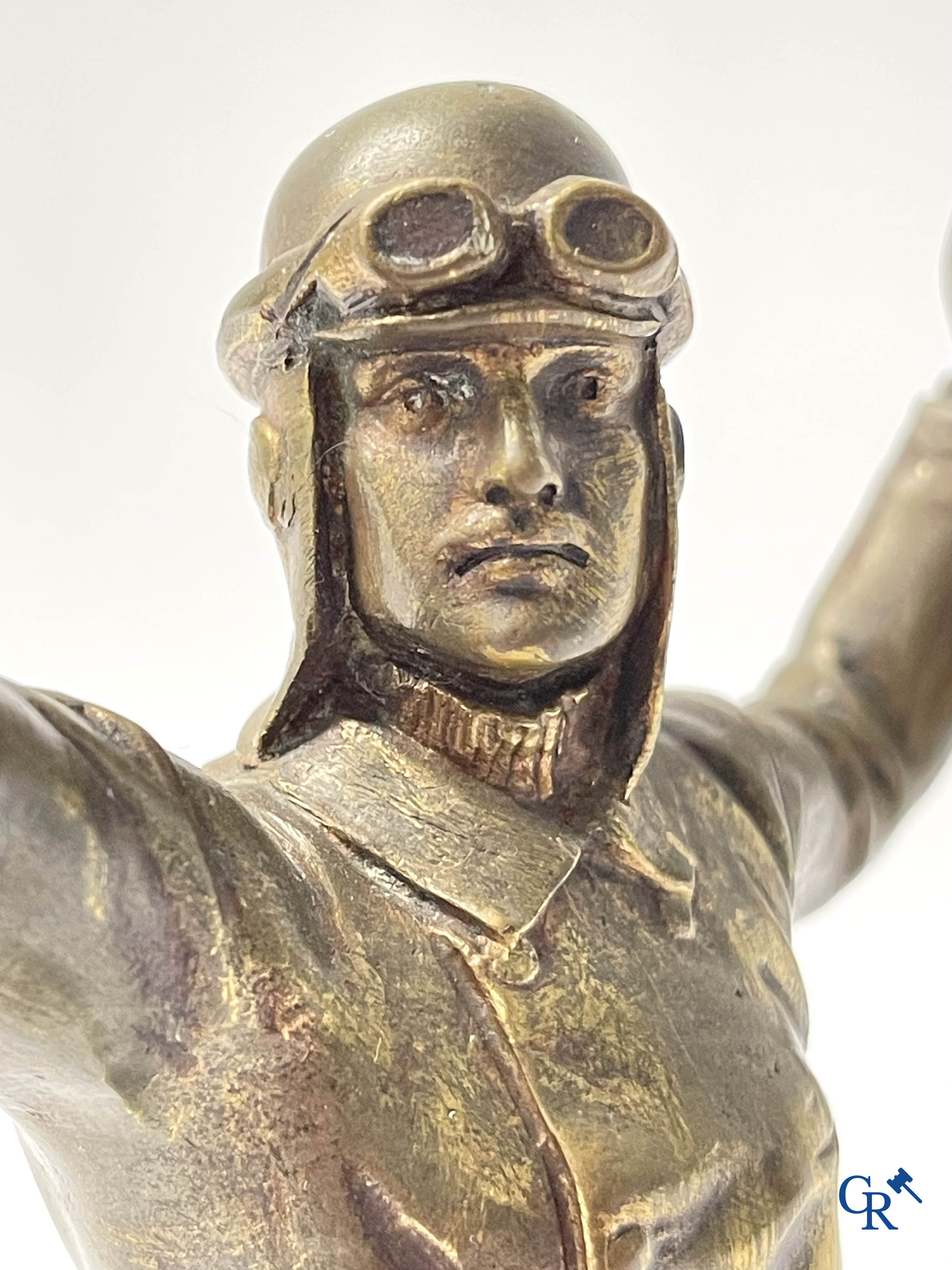 Aeronautics, a bronze representation of an aircraft pilot with propeller. Around 1930.