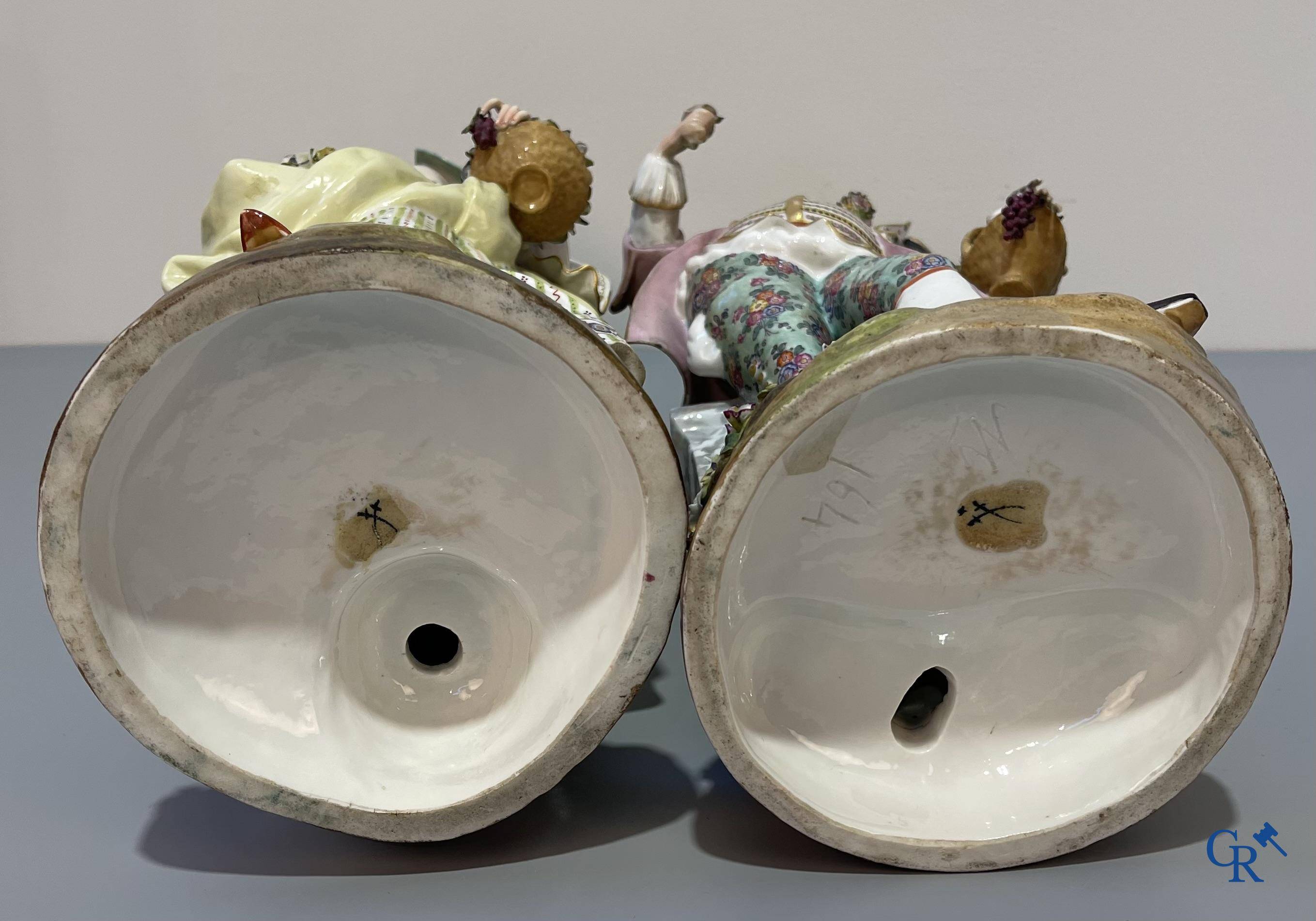 European porcelain, Meissen, a couple in finely polychromed German porcelain. Marked with the swords.