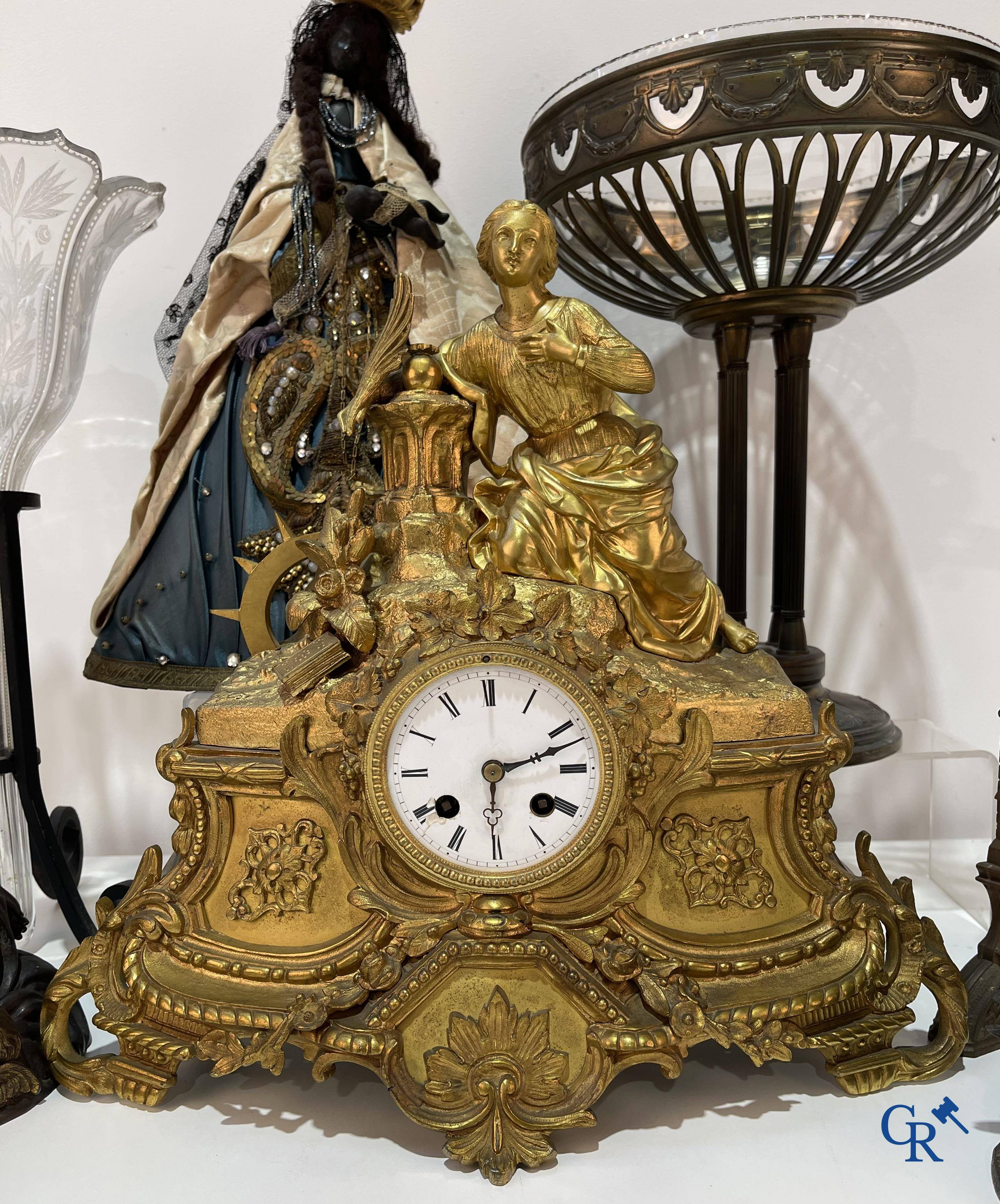 A lot with brocante: Bronze clock, bronze neo Gothic candlesticks and a statue of St. Catharina, soliflore etc.