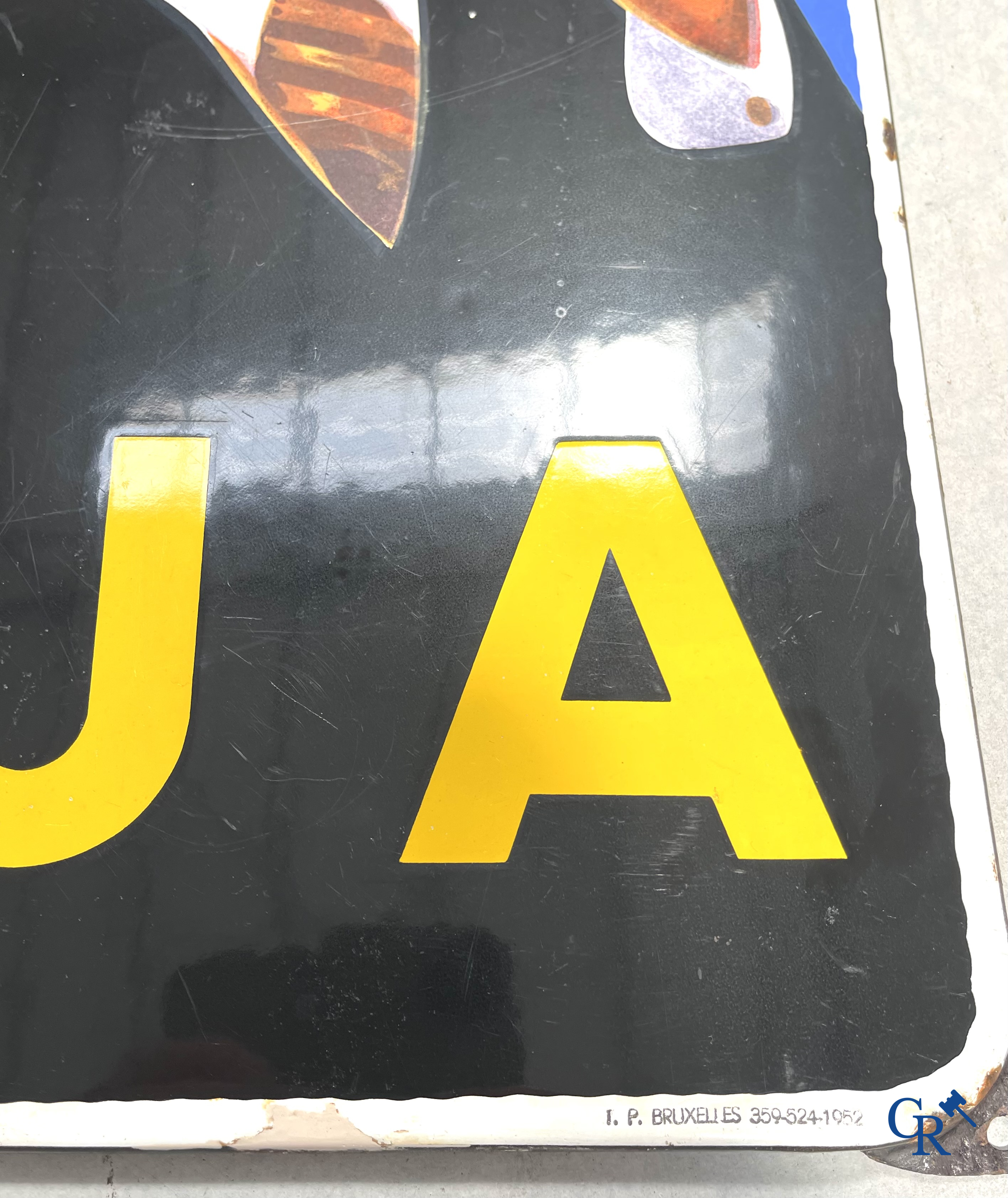 AJJA, Enamel advertising sign for AJJA tobacco products. Emaillerie Odon Warland. T.P. Bruxelles 1952.