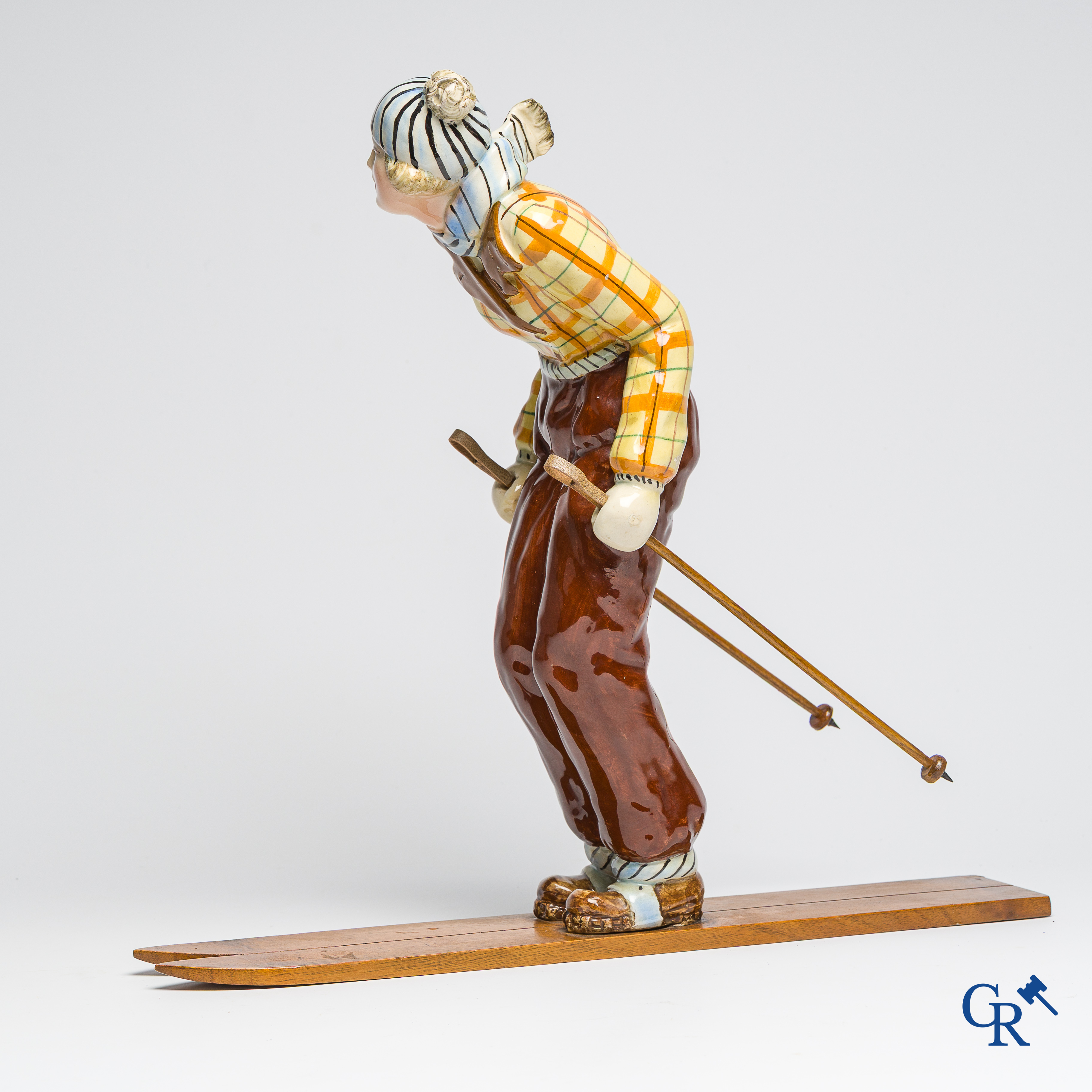 Art Deco, Hertwig and Company, Katzhütte, Thüringen. Skier in fine polychrome and glazed pottery. Circa 1930.