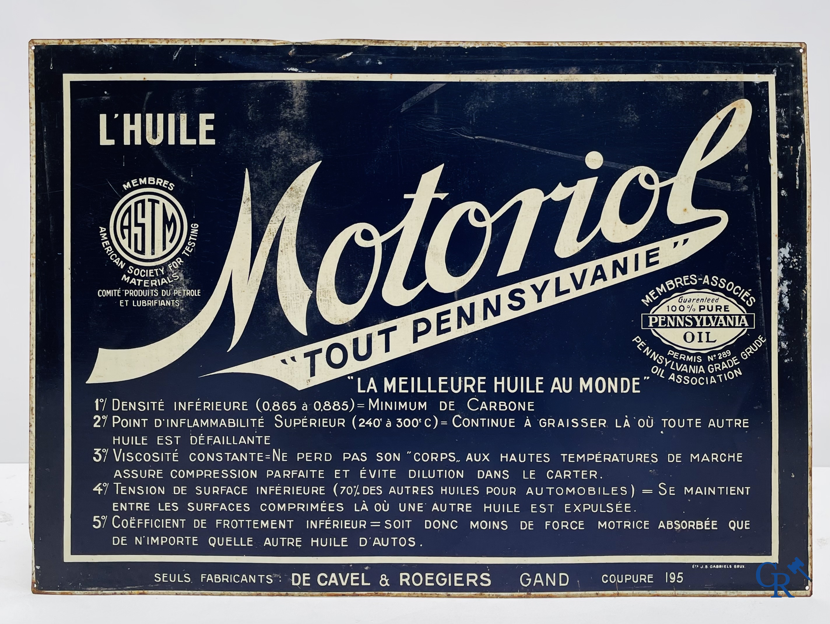 Motoriol Olie. Blikken reclamebord voor de oliën van de fabrikanten De Cavel & Rougiers te Gent. Jaren '40.