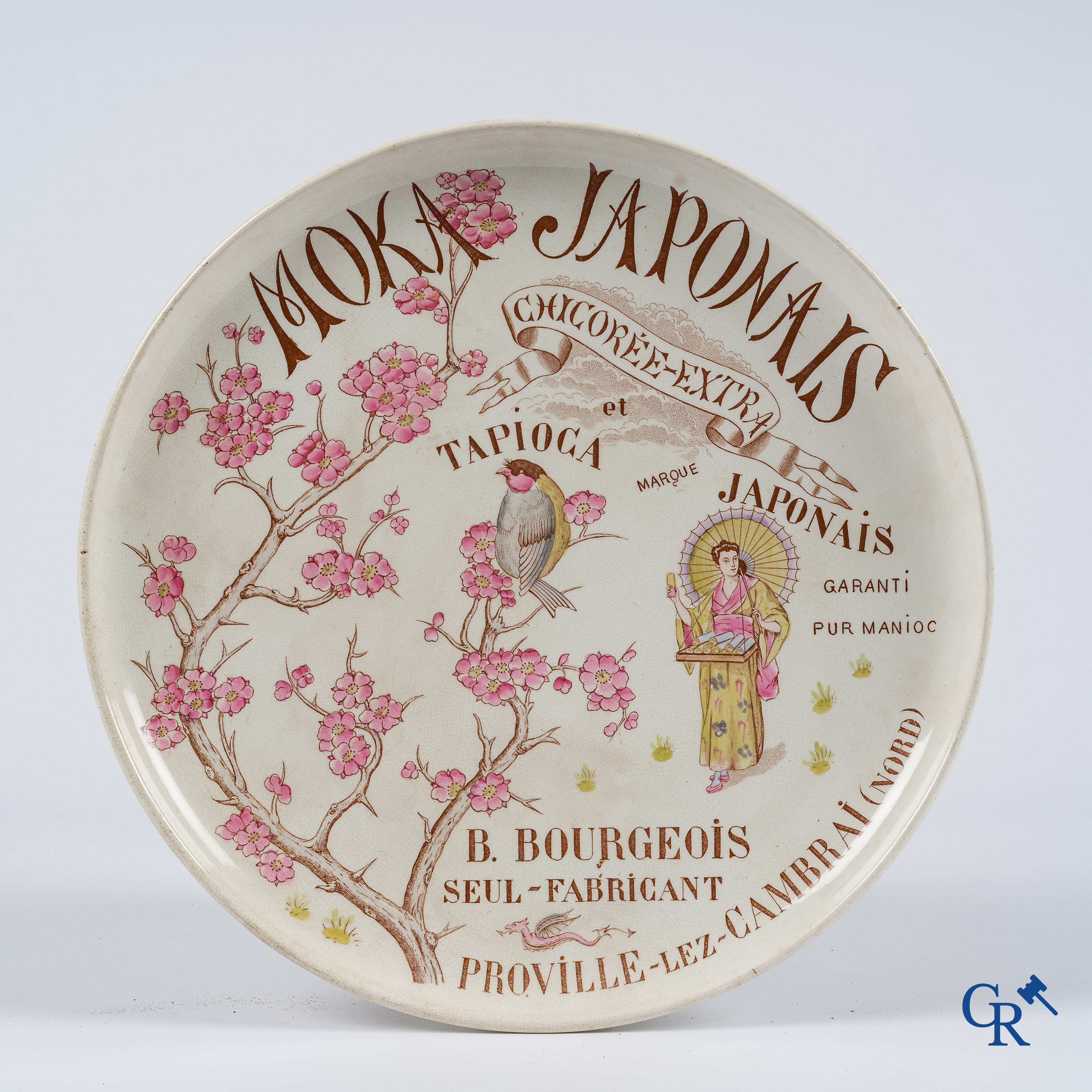 Large publicity plate in majolica for Moka & Tapioca Japonais. B. Bourgeois à Proville-Lez-Cambrai. Circa 1910.
