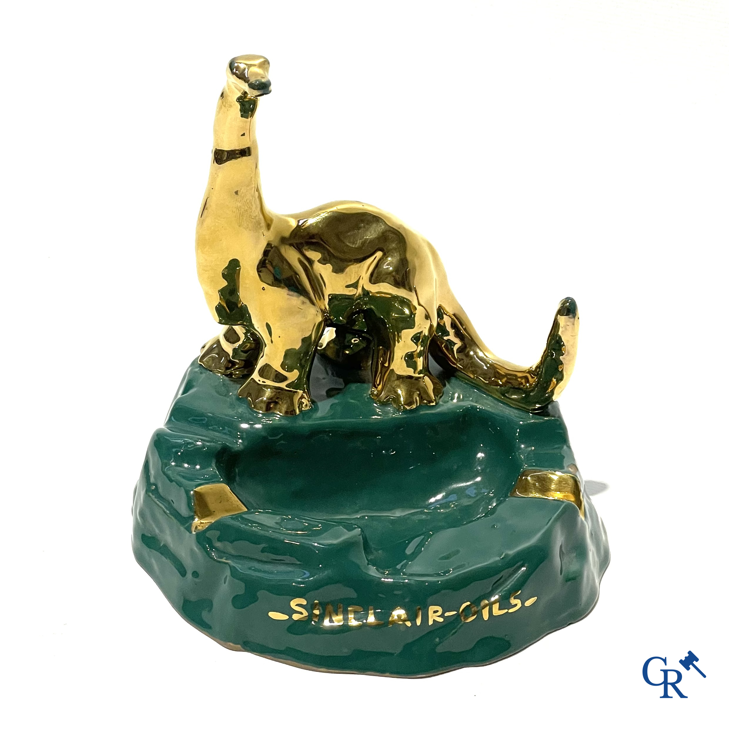 Sinclair. Publicity ashtray with a dinosaur in enamelled faience for the Sinclair Oil Corporation. 1950's.