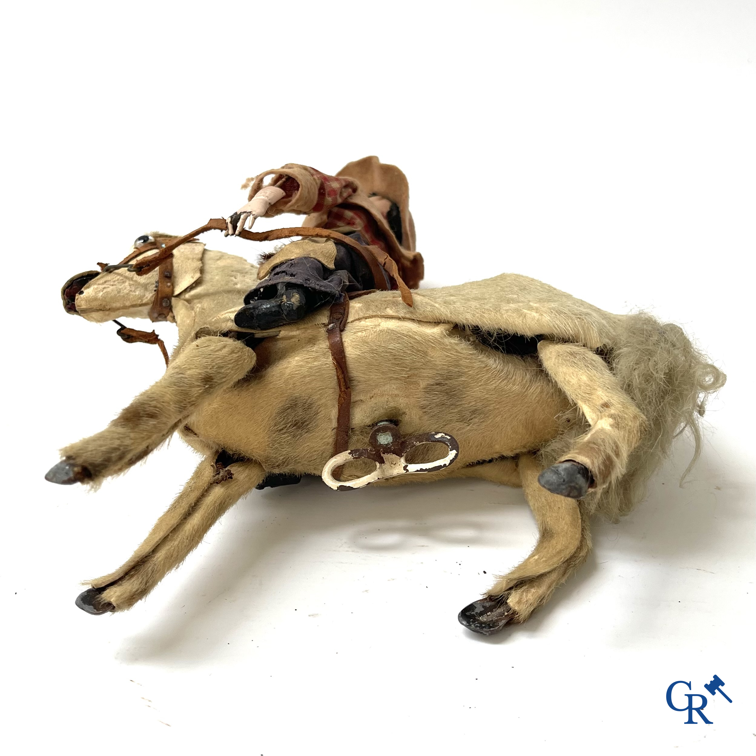 Jouets anciens. Roullet & Decamps. "Cheval sauteur cowboy" Jouet mécanique, cheval avec cow-boy. Circa 1910-1920.