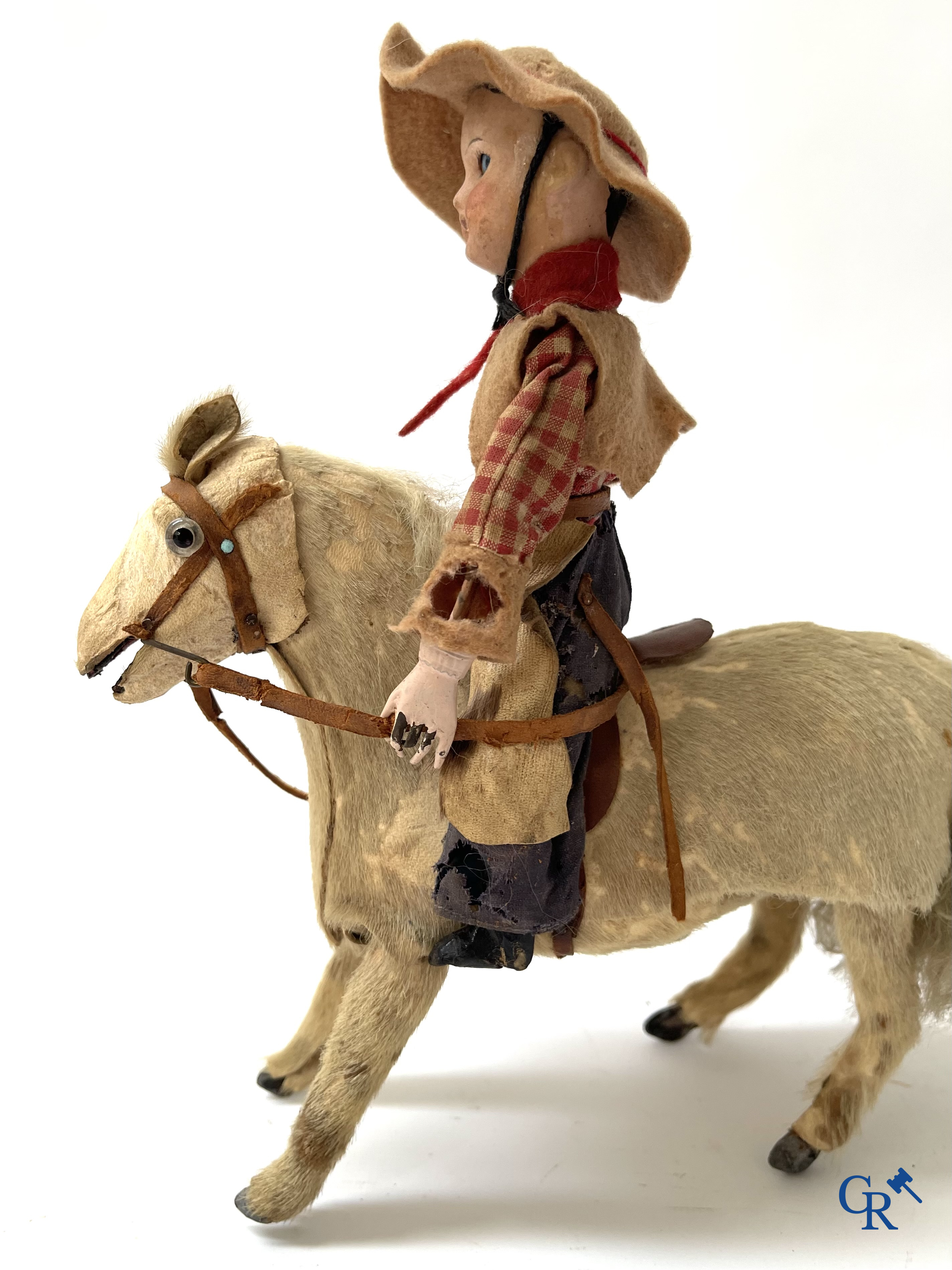 Jouets anciens. Roullet & Decamps. "Cheval sauteur cowboy" Jouet mécanique, cheval avec cow-boy. Circa 1910-1920.