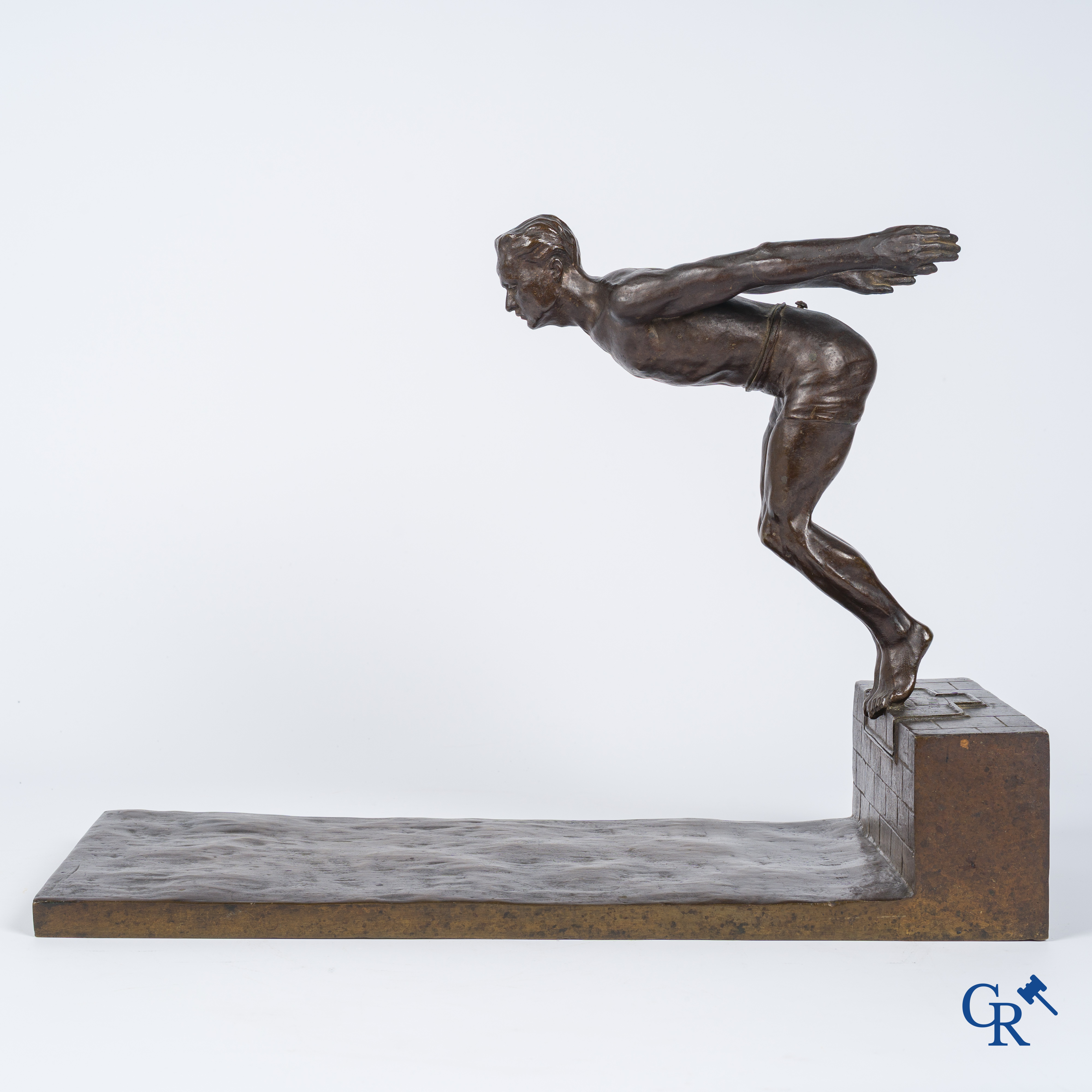 J. Duquet. Art Deco. Bronze statue of a swimmer "The dive" Brown patina. Signed. Circa 1930.