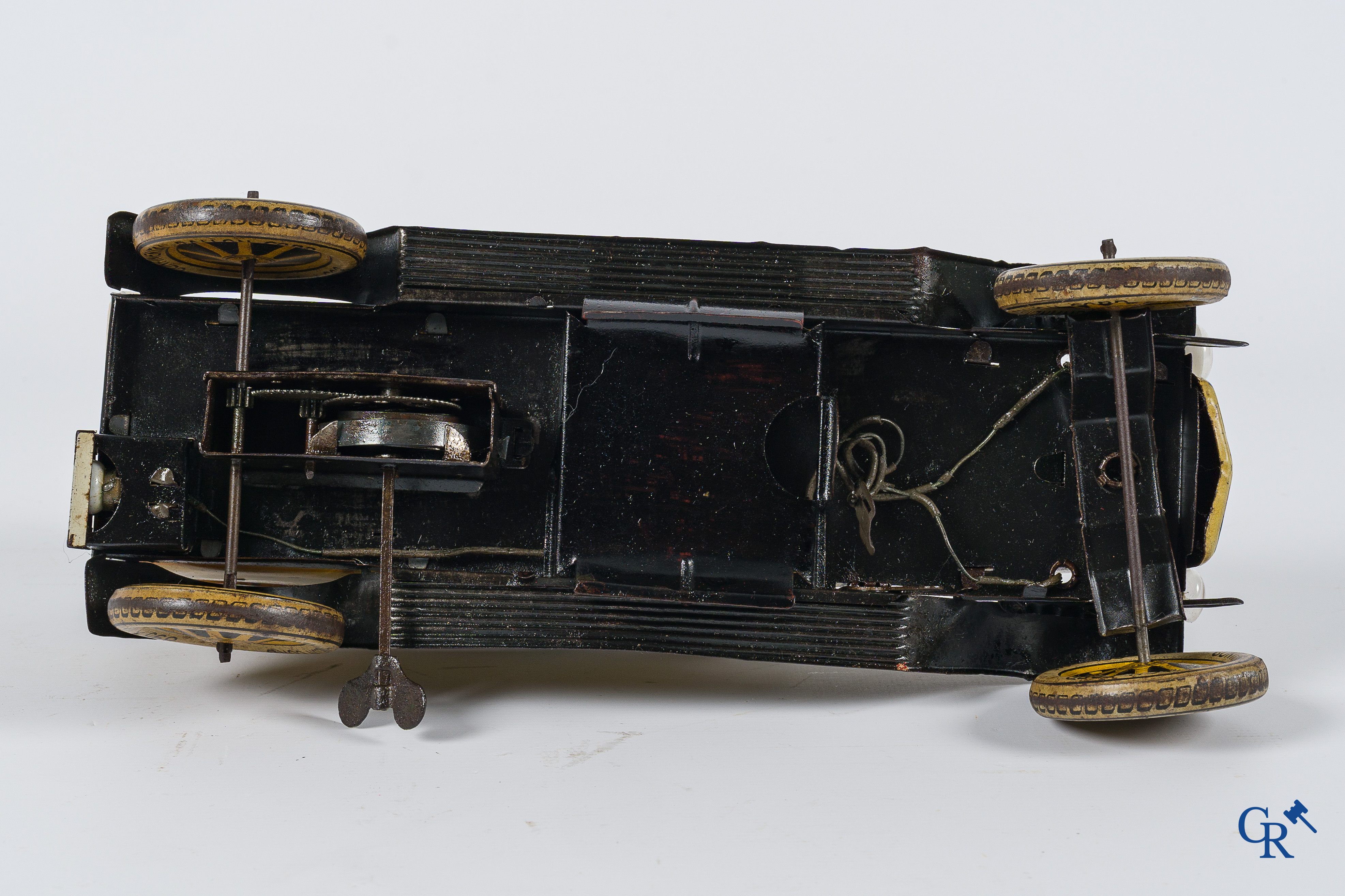 Old toys. Distler, Germany. Limousine with accompanying garage. Metal with winding mechanism. 1920's- 1930's.