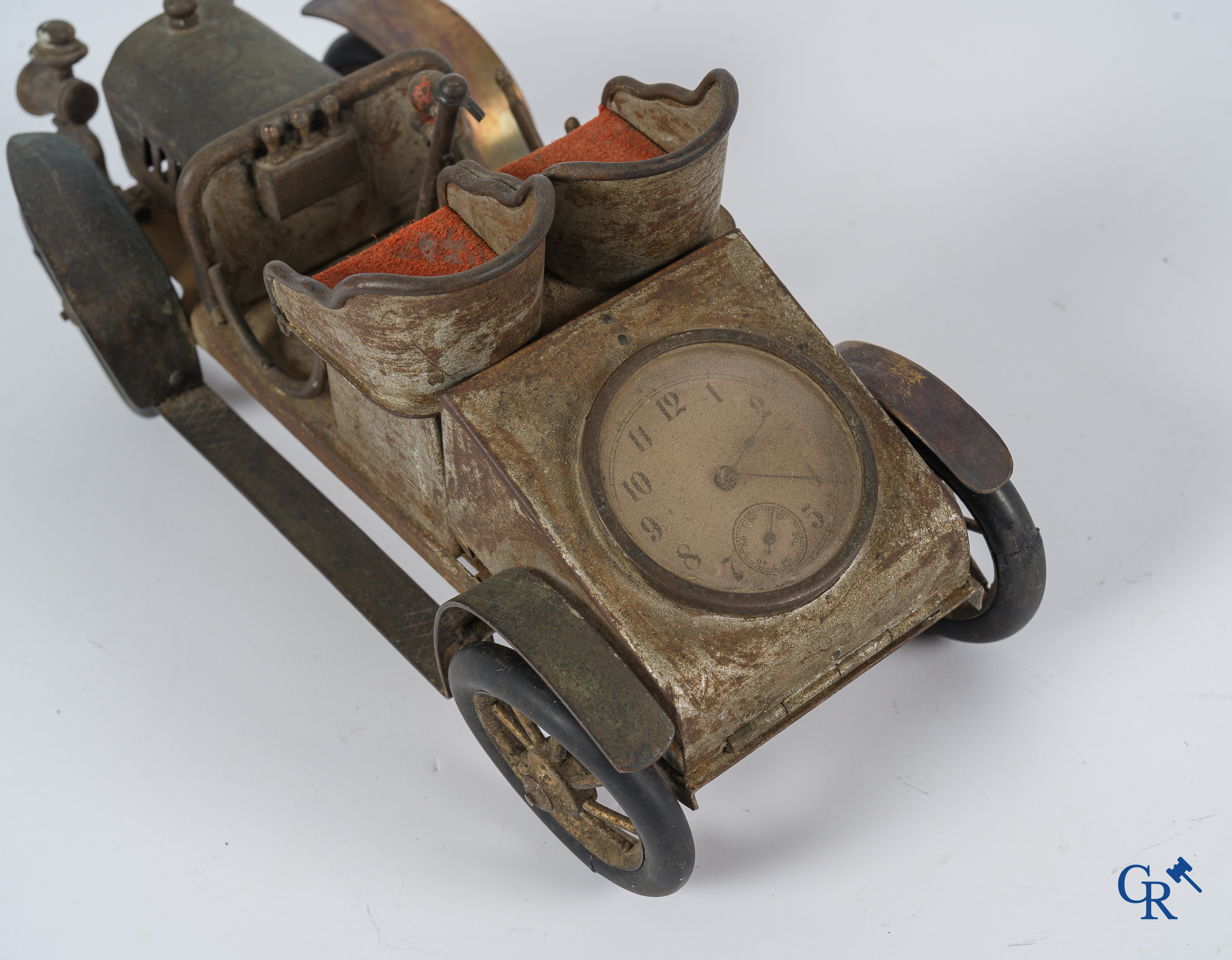 Chevob & Co. Desk set in the form of an open tourer with integrated clock and an early fire truck. Early 1900.