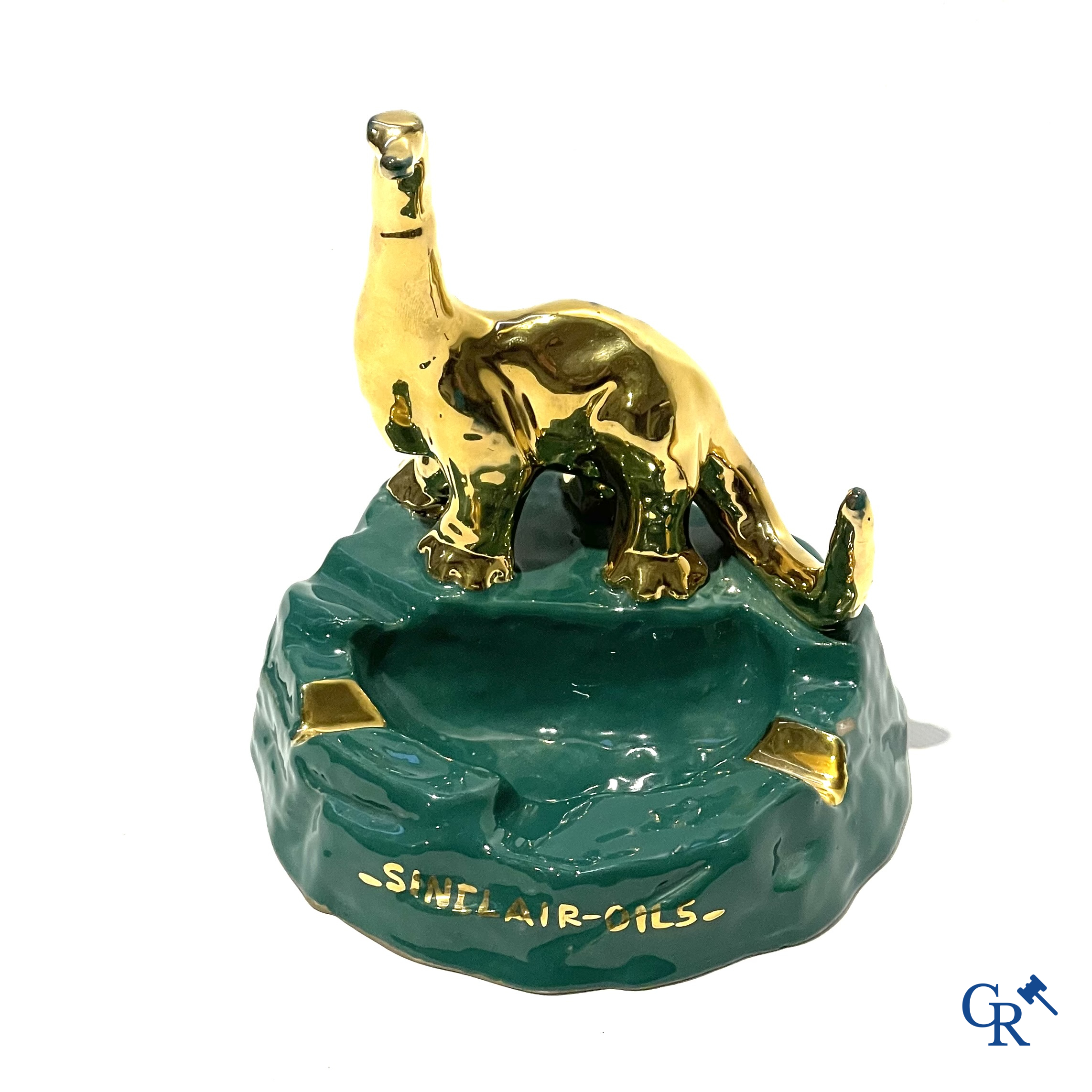 Sinclair. Publicity ashtray with a dinosaur in enamelled faience for the Sinclair Oil Corporation. 1950's.
