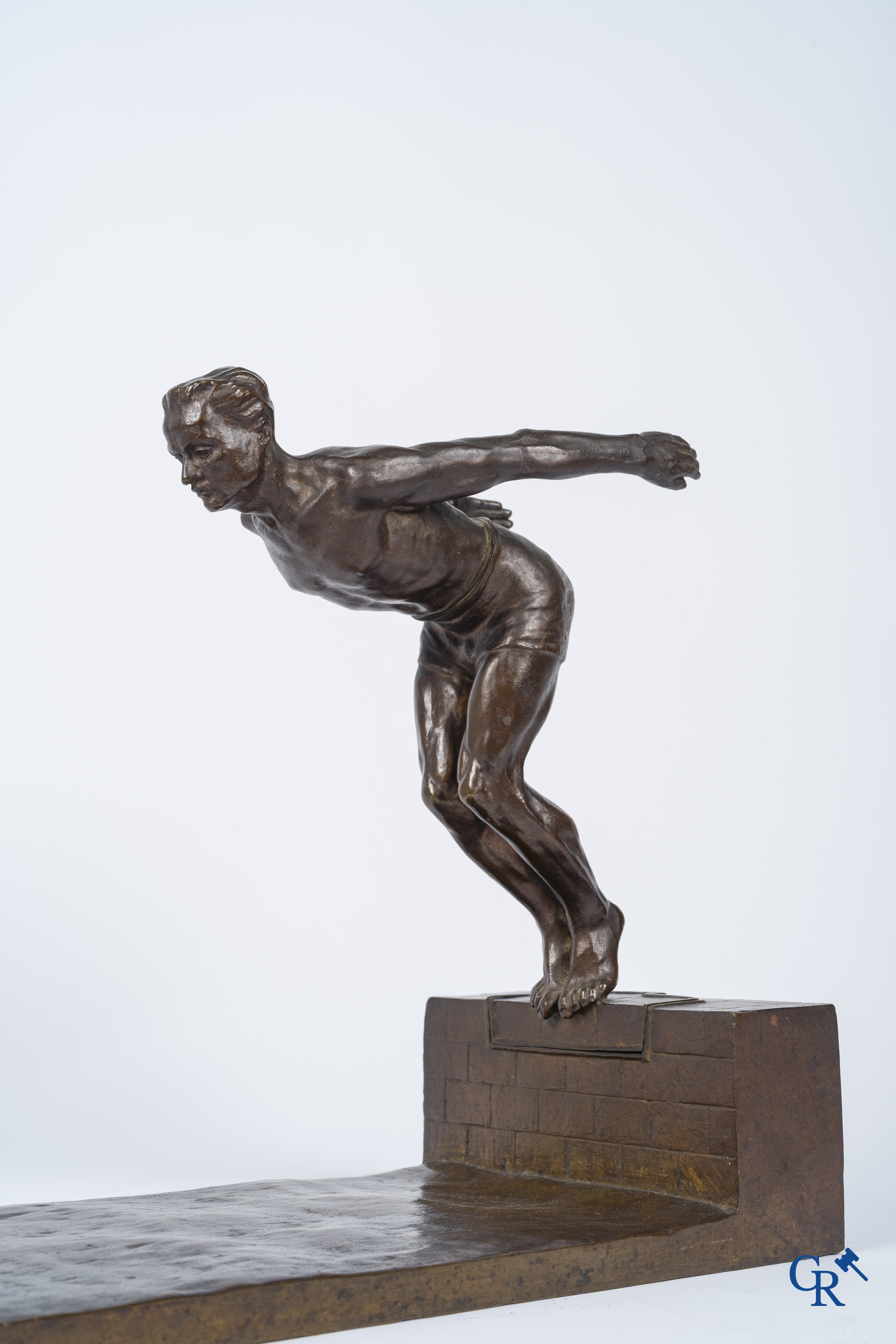 J. Duquet. Art Deco. Bronze statue of a swimmer "The dive" Brown patina. Signed. Circa 1930.