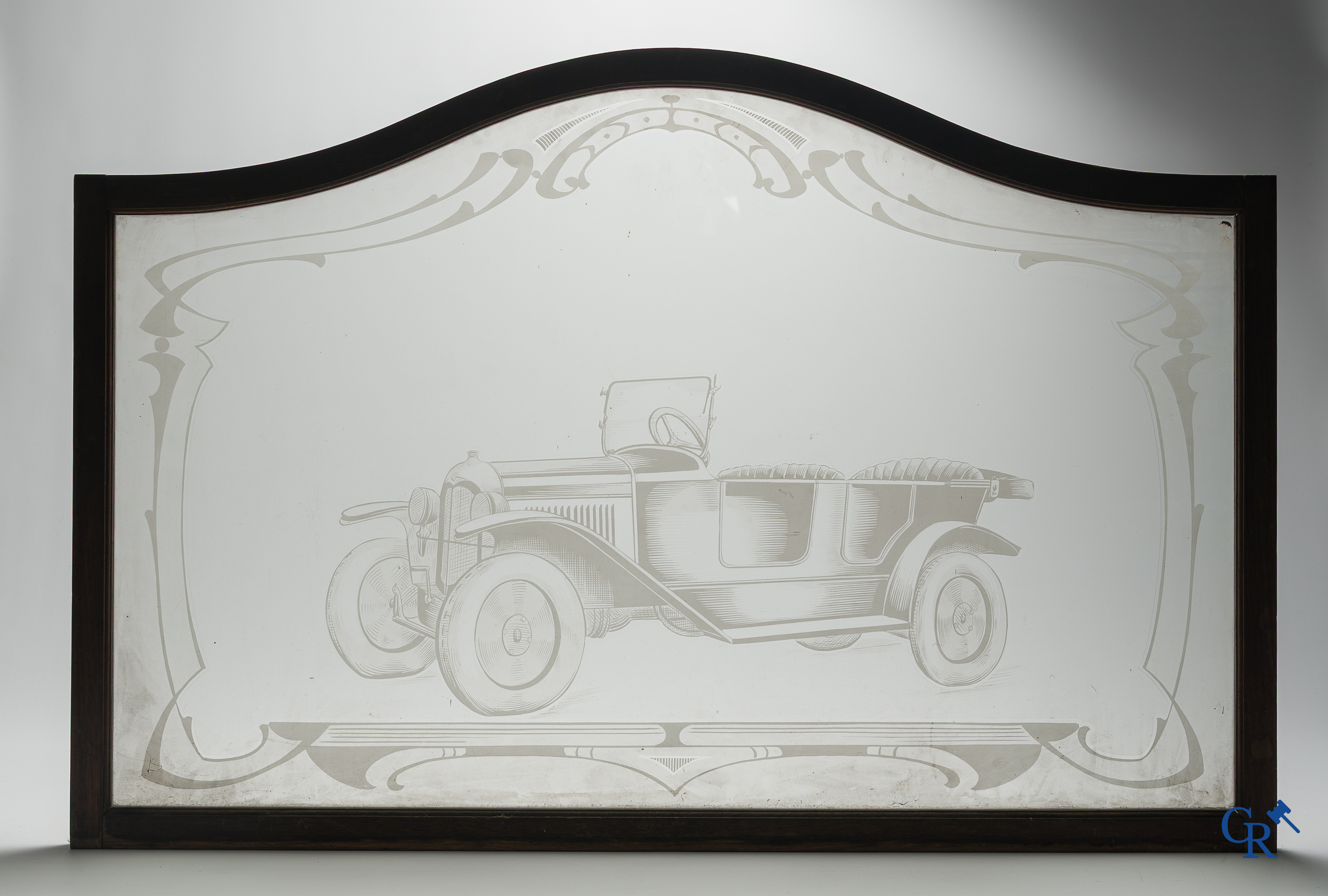 Automobilia. 2 old etched windows in oak frame depicting a Citroën Torpedo and a Berliet van. Circa 1925-1930.