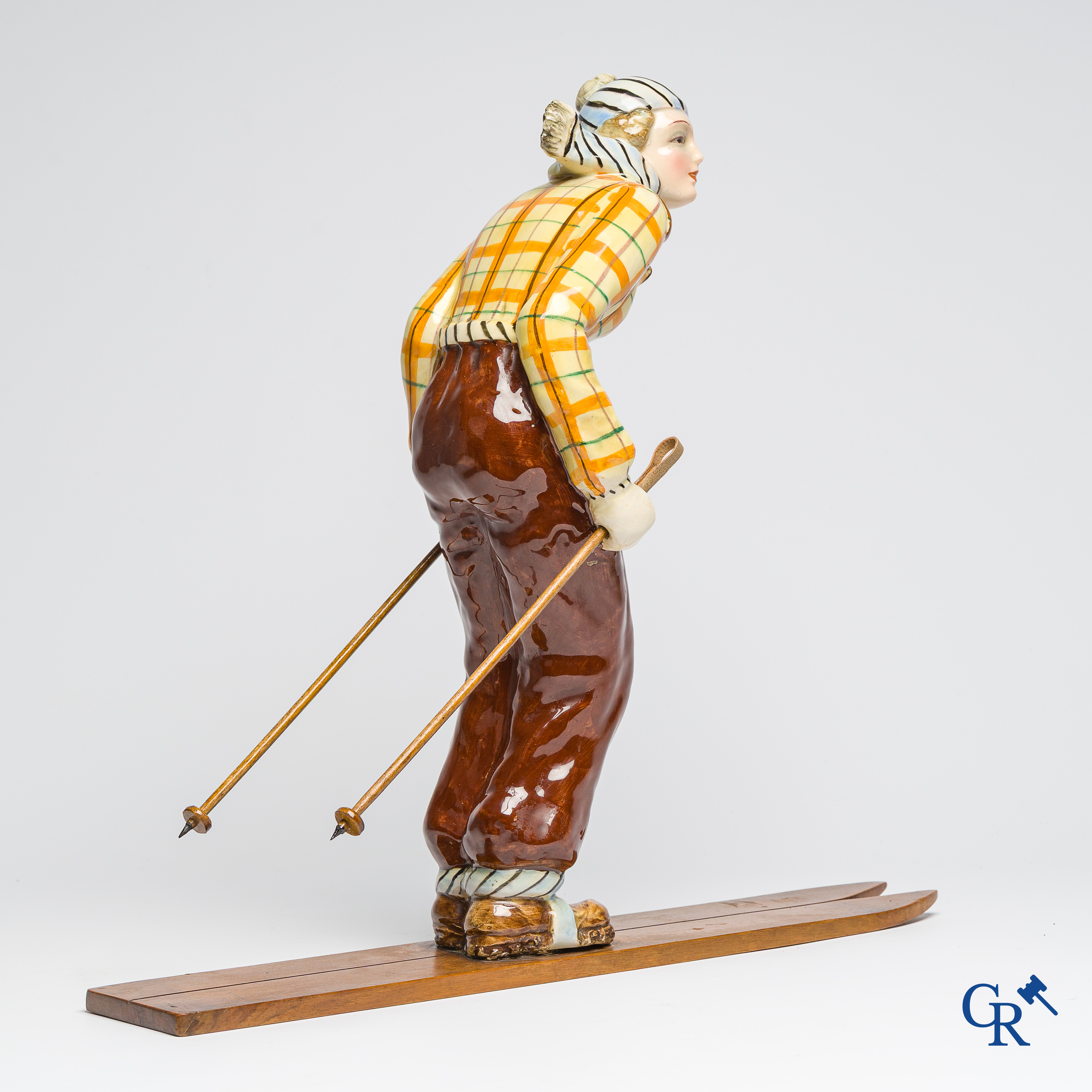 Art Deco, Hertwig and Company, Katzhütte, Thüringen. Skier in fine polychrome and glazed pottery. Circa 1930.
