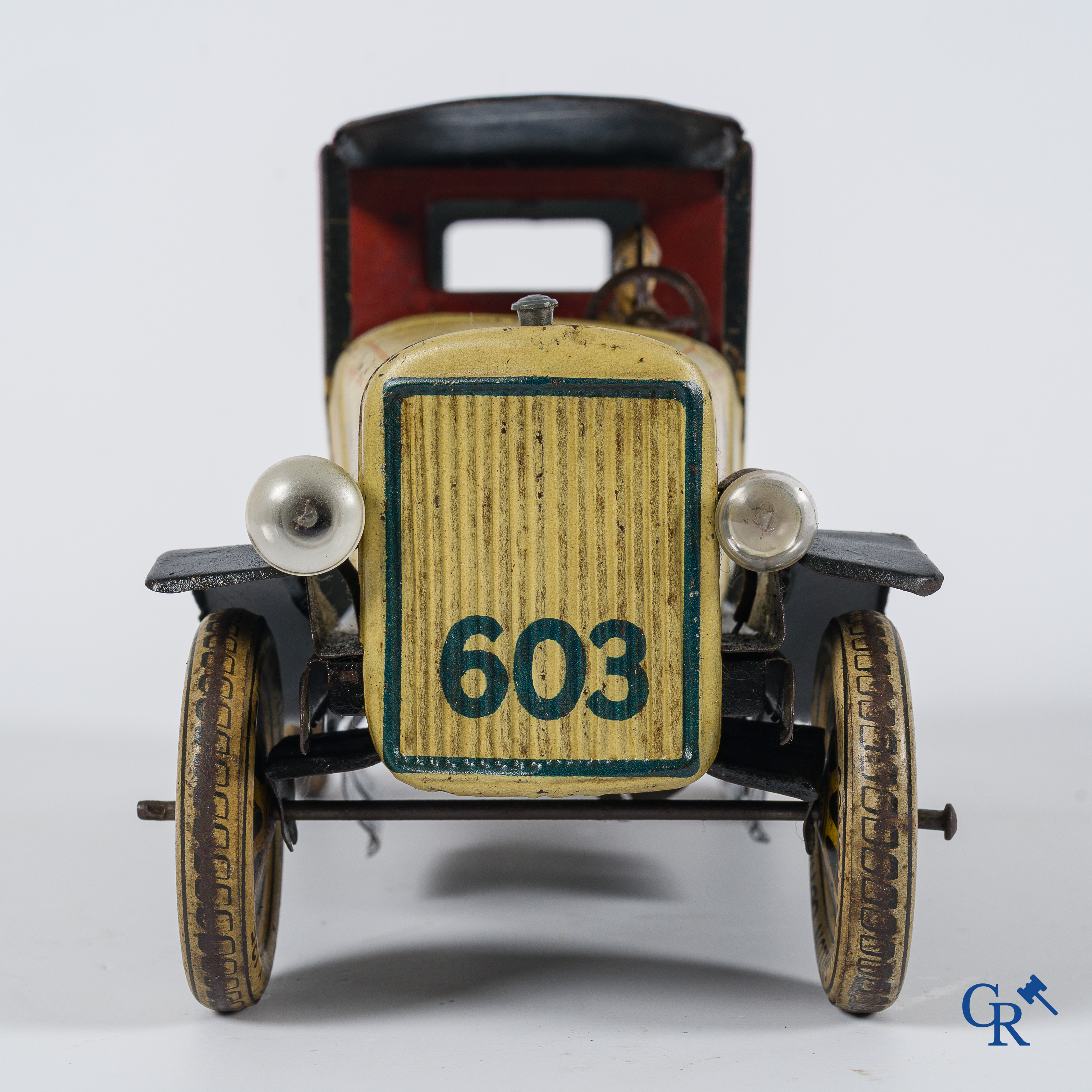 Old toys. Distler, Germany. Limousine with accompanying garage. Metal with winding mechanism. 1920's- 1930's.