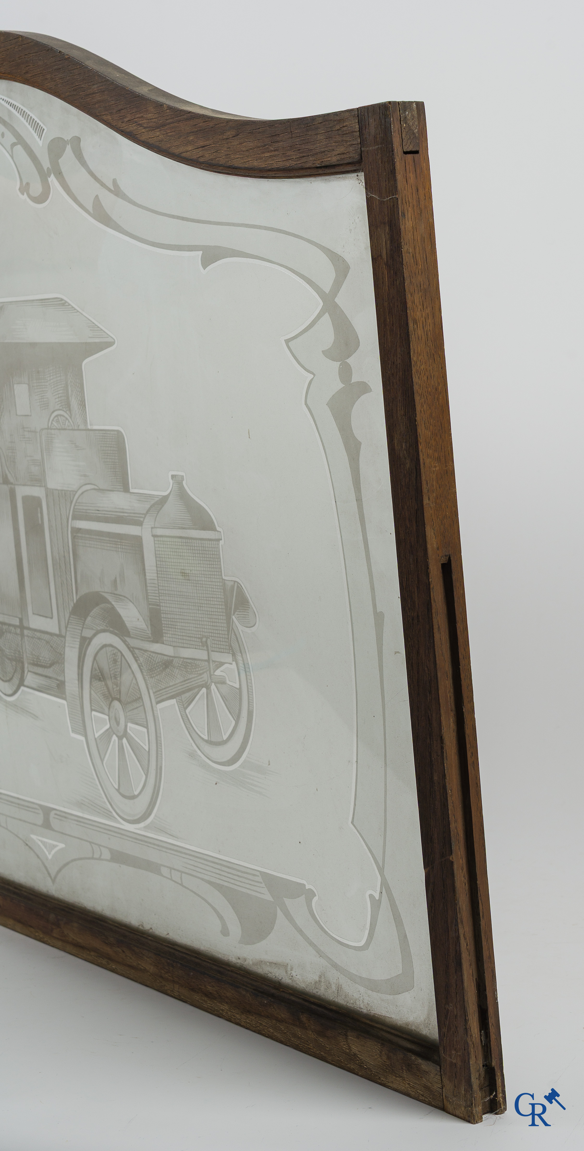 Automobilia. 2 old etched windows in oak frame depicting a Citroën Torpedo and a Berliet van. Circa 1925-1930.