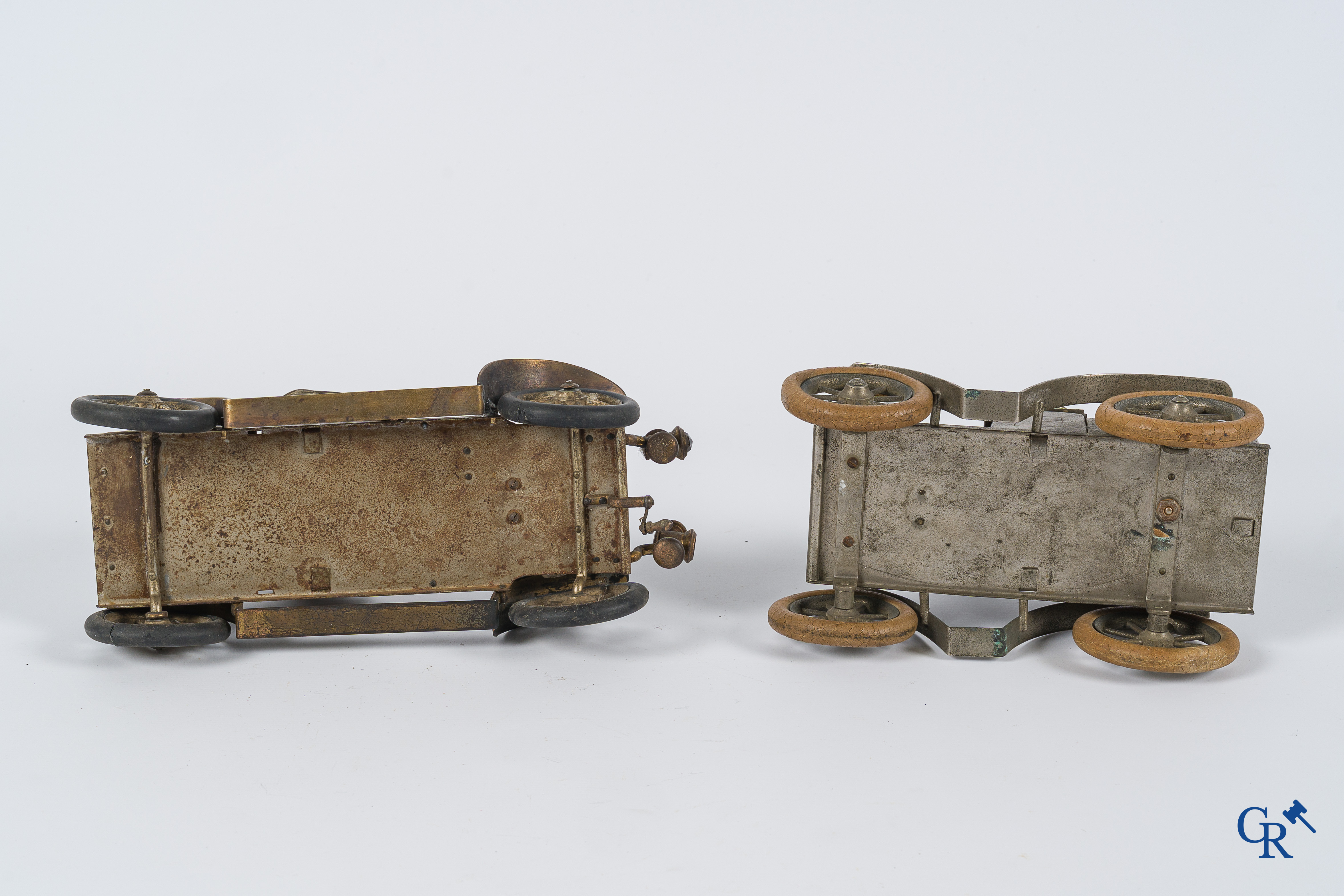 Chevob & Co. Desk set in the form of an open tourer with integrated clock and an early fire truck. Early 1900.
