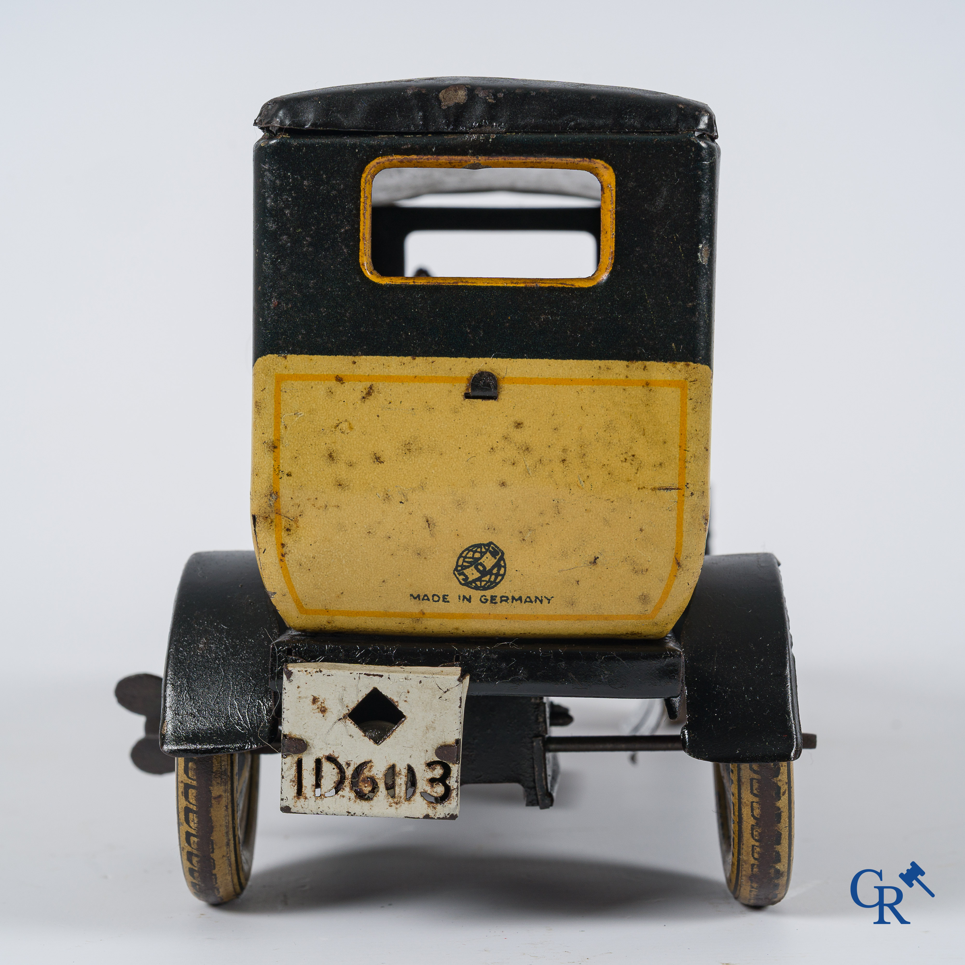Old toys. Distler, Germany. Limousine with accompanying garage. Metal with winding mechanism. 1920's- 1930's.