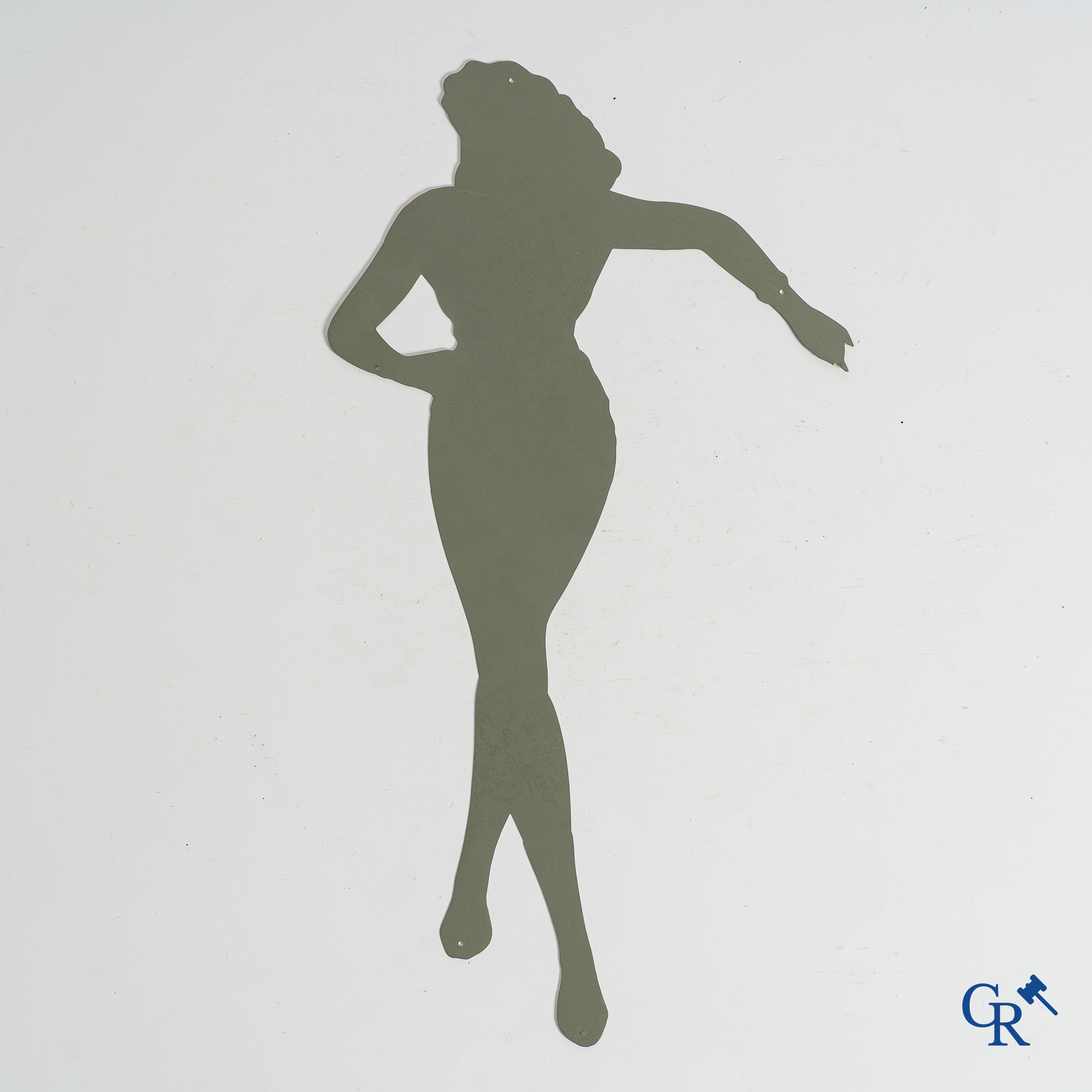Veedol. Original Pin up or "Ice Skating girl" in metal. Publicity for Veedol motor oil. 1950's-1960's.