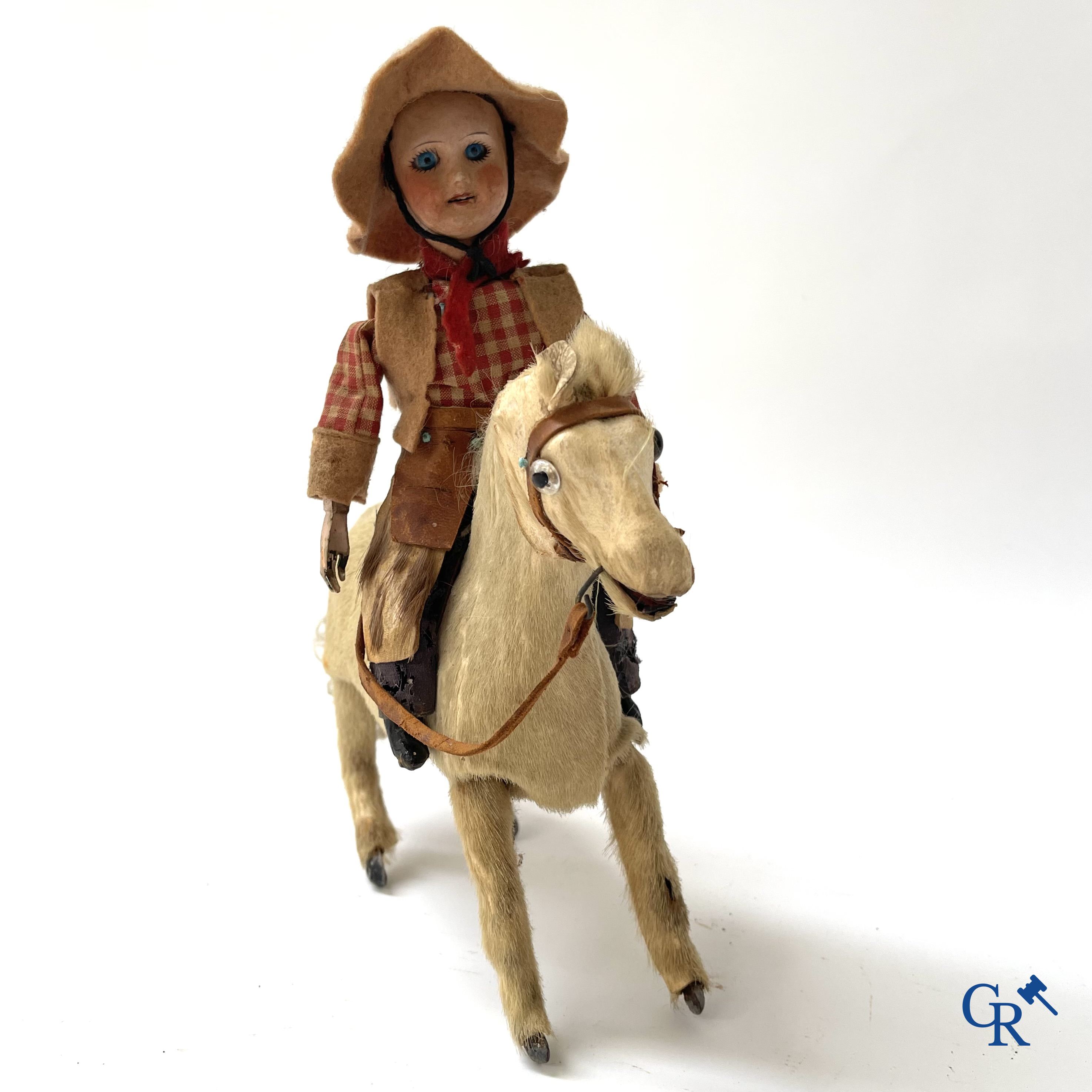 Jouets anciens. Roullet & Decamps. "Cheval sauteur cowboy" Jouet mécanique, cheval avec cow-boy. Circa 1910-1920.