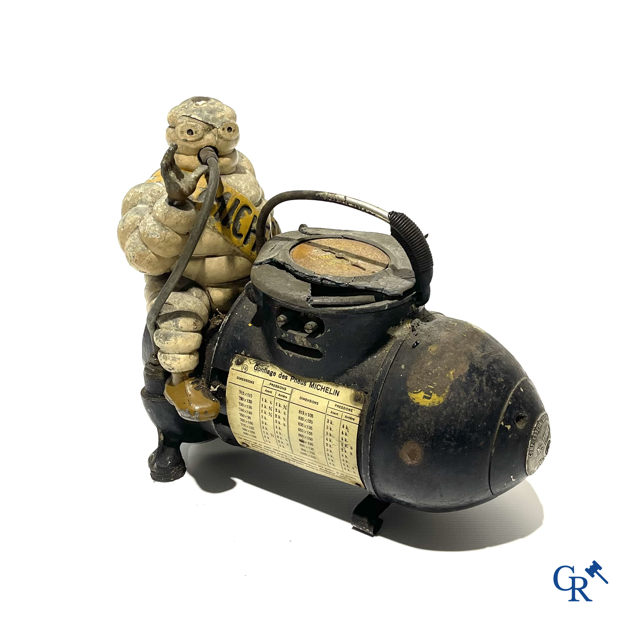 Michelin. Gonfleur with Bibendum in polychrome cast iron. Compressor Luchard n°9267. Moteur Paris-Rhône. Circa 1930.