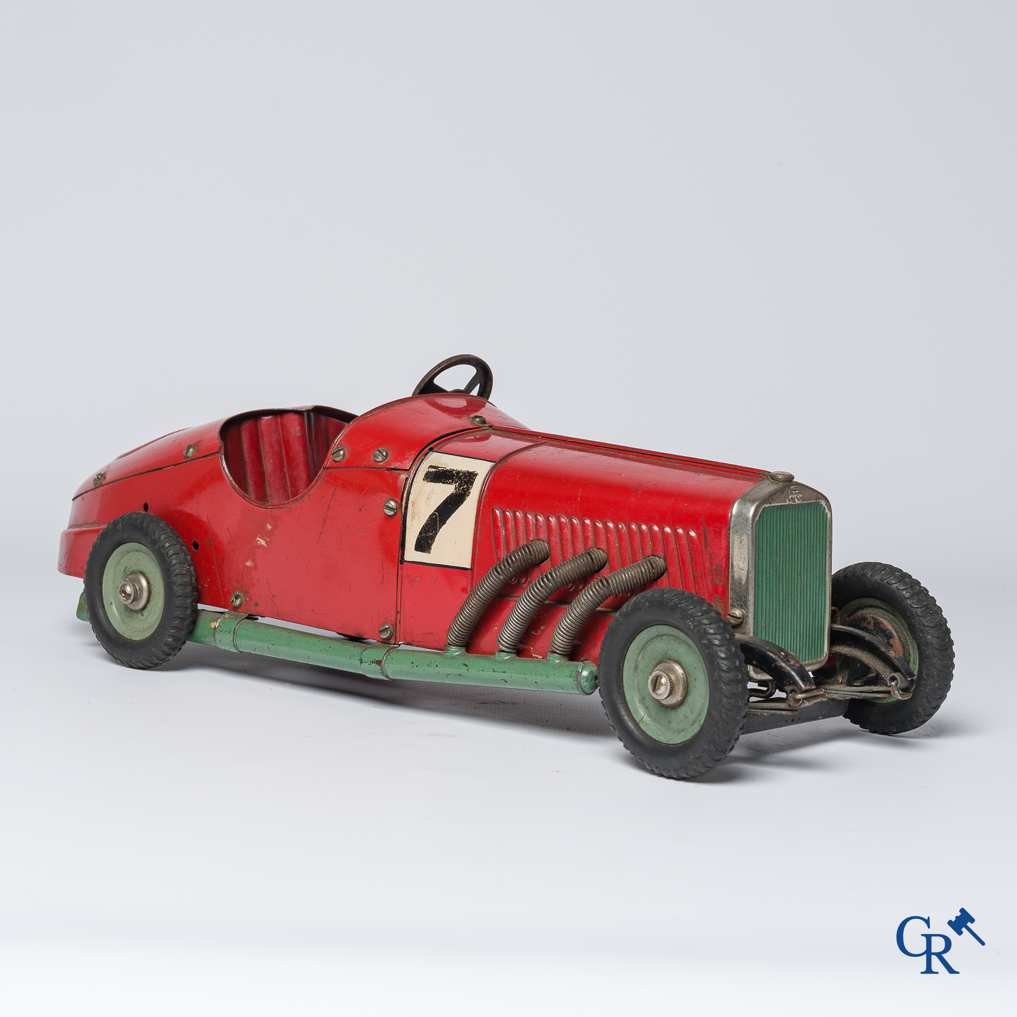 Märklin. Oud speelgoed. Originele opwindbare Mercedes modelauto in beschilderd blik. 30'er jaren.