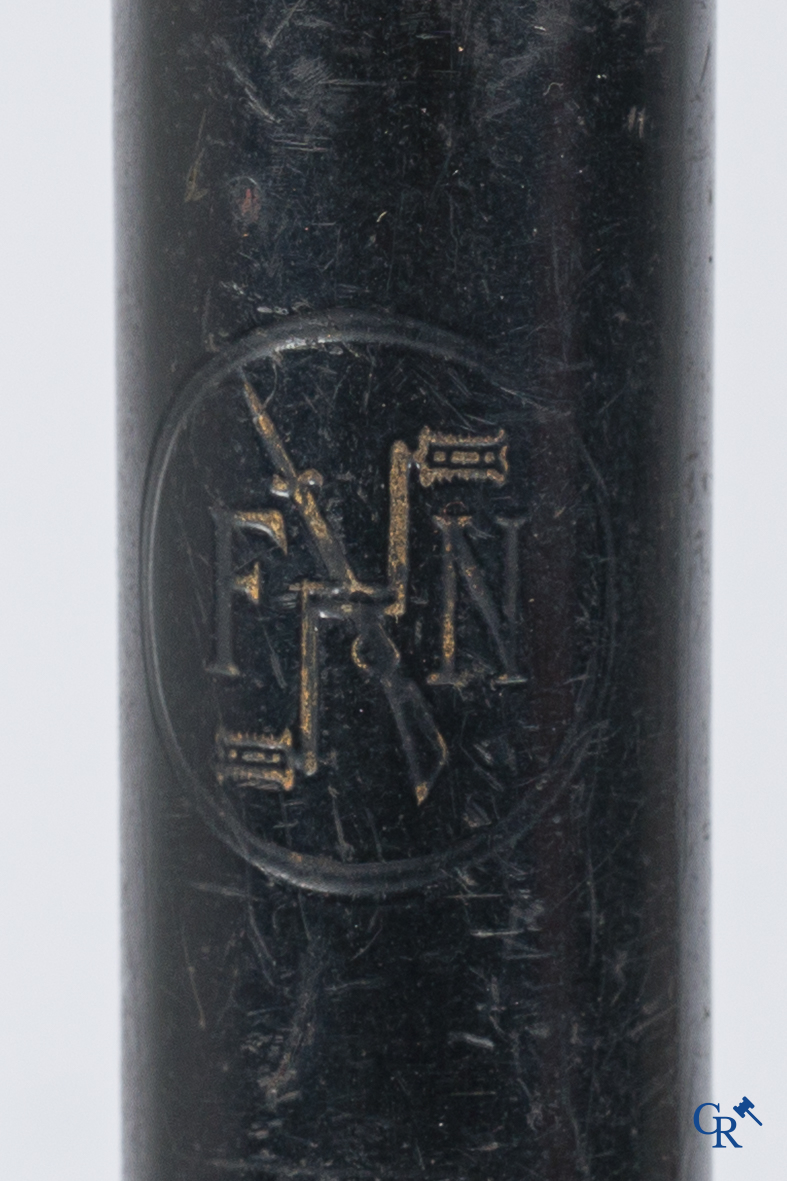 Fabrique Nationale Herstal. FN. Rare motorcycle pump in bakelite and metal with the FN logo. Circa 1910-1920.