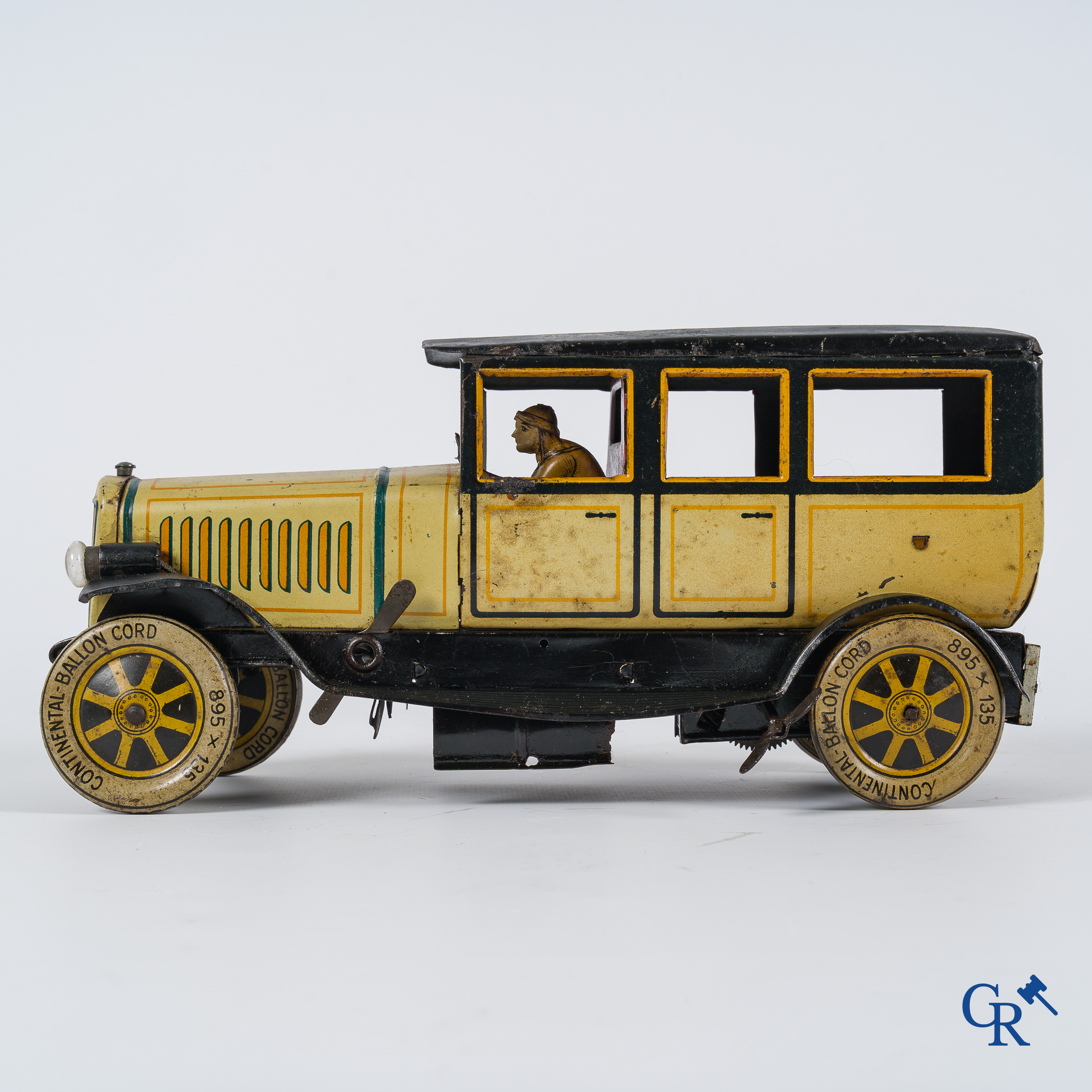 Old toys. Distler, Germany. Limousine with accompanying garage. Metal with winding mechanism. 1920's- 1930's.