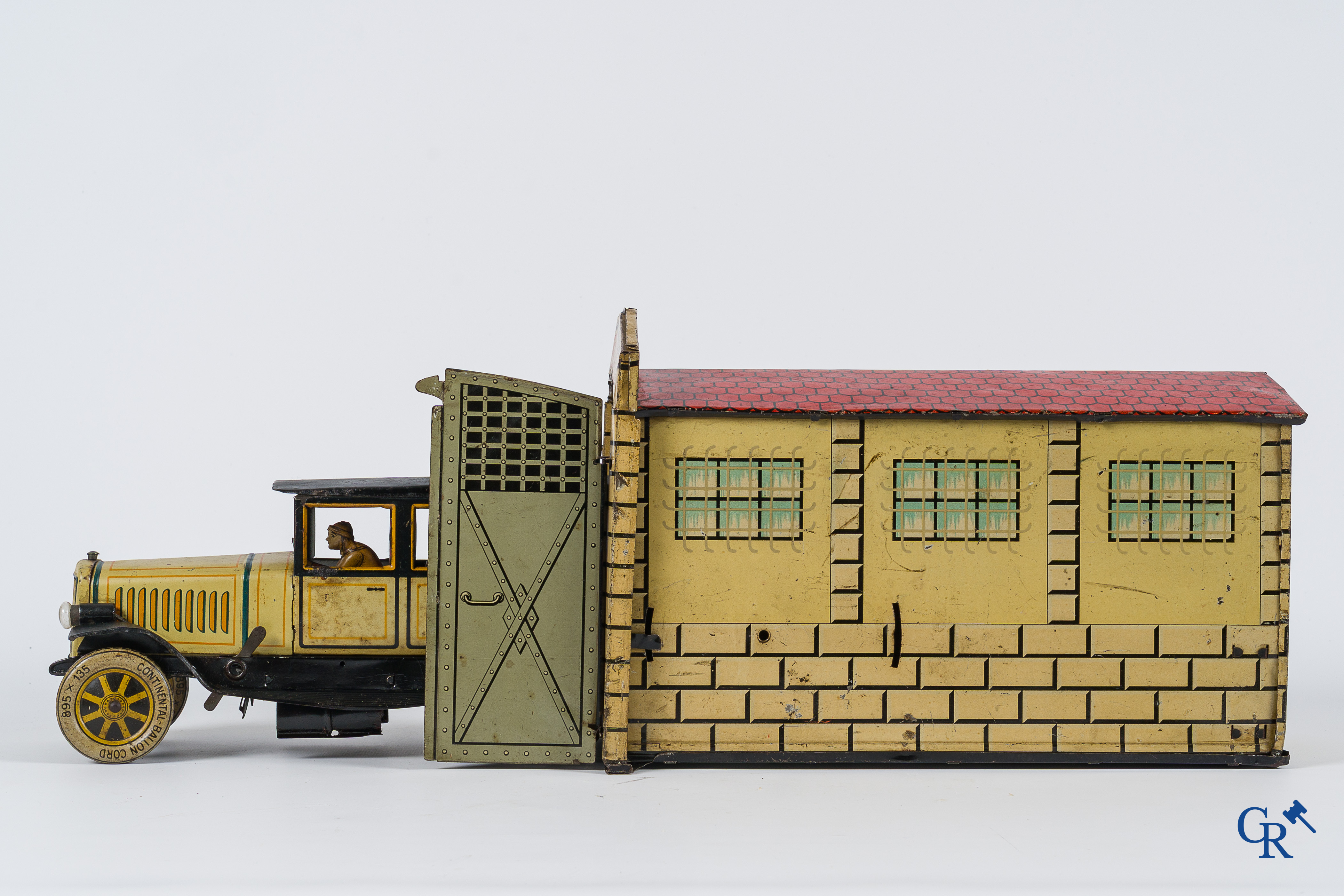 Old toys. Distler, Germany. Limousine with accompanying garage. Metal with winding mechanism. 1920's- 1930's.